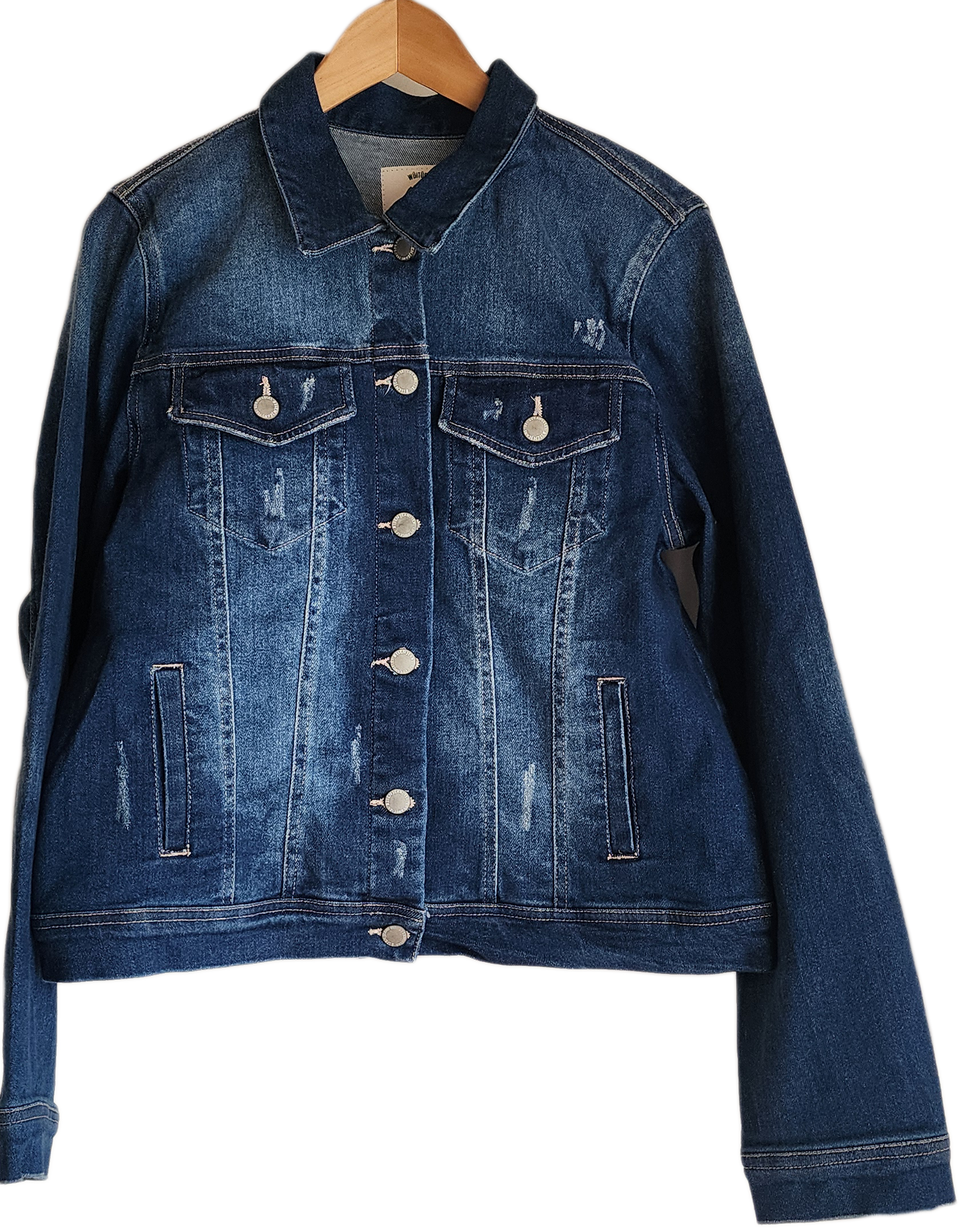 "Colorful handmade punch needle denim jacket with vibrant, artisanal embroidery on the back, showcasing unique craftsmanship.