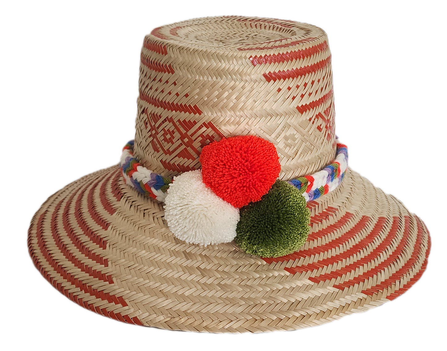 Boho Wayuu straw hat with red artisan weave, a multicolor braided band, and playful pom-poms in red, white, and green — a colorful, handcrafted bohemian straw hat perfect for summer.