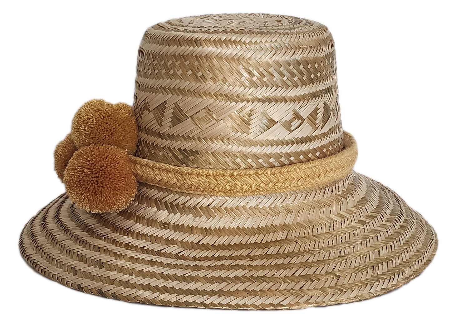 Boho Wayuu straw hat in natural beige tones with intricate geometric patterns, a soft mustard pom-pom trio, and braided band — a handcrafted, bohemian-style accessory with artisan elegance.