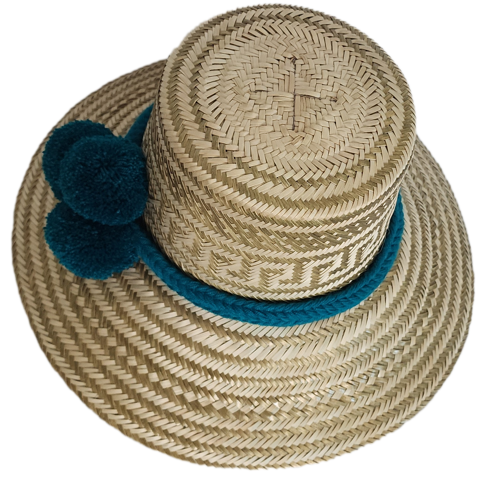 Boho Wayuu straw hat in natural tones with subtle gold accents, adorned with teal pom-poms and a matching braided band — a handcrafted bohemian fashion accessory with colorful artisan charm.