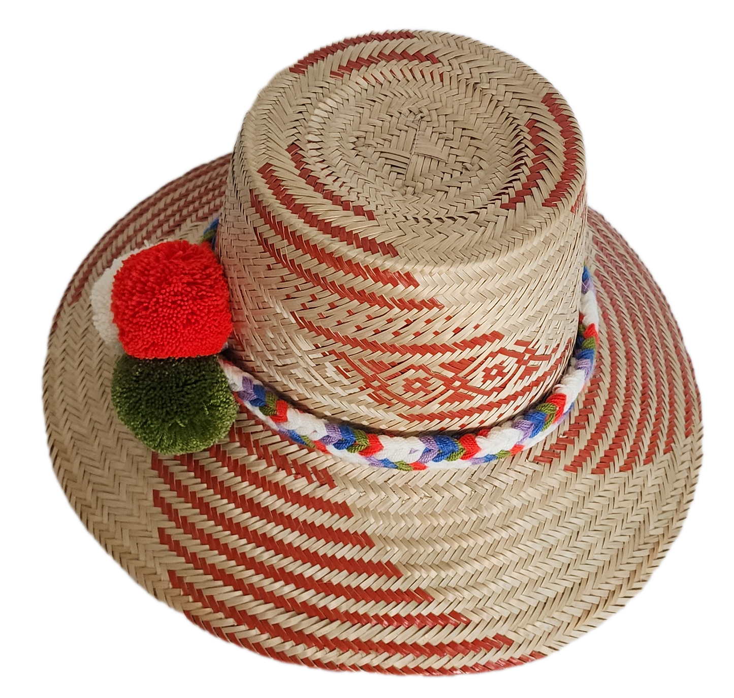 Boho Wayuu straw hat with red artisan weave, a multicolor braided band, and playful pom-poms in red, white, and green — a colorful, handcrafted bohemian straw hat perfect for summer.