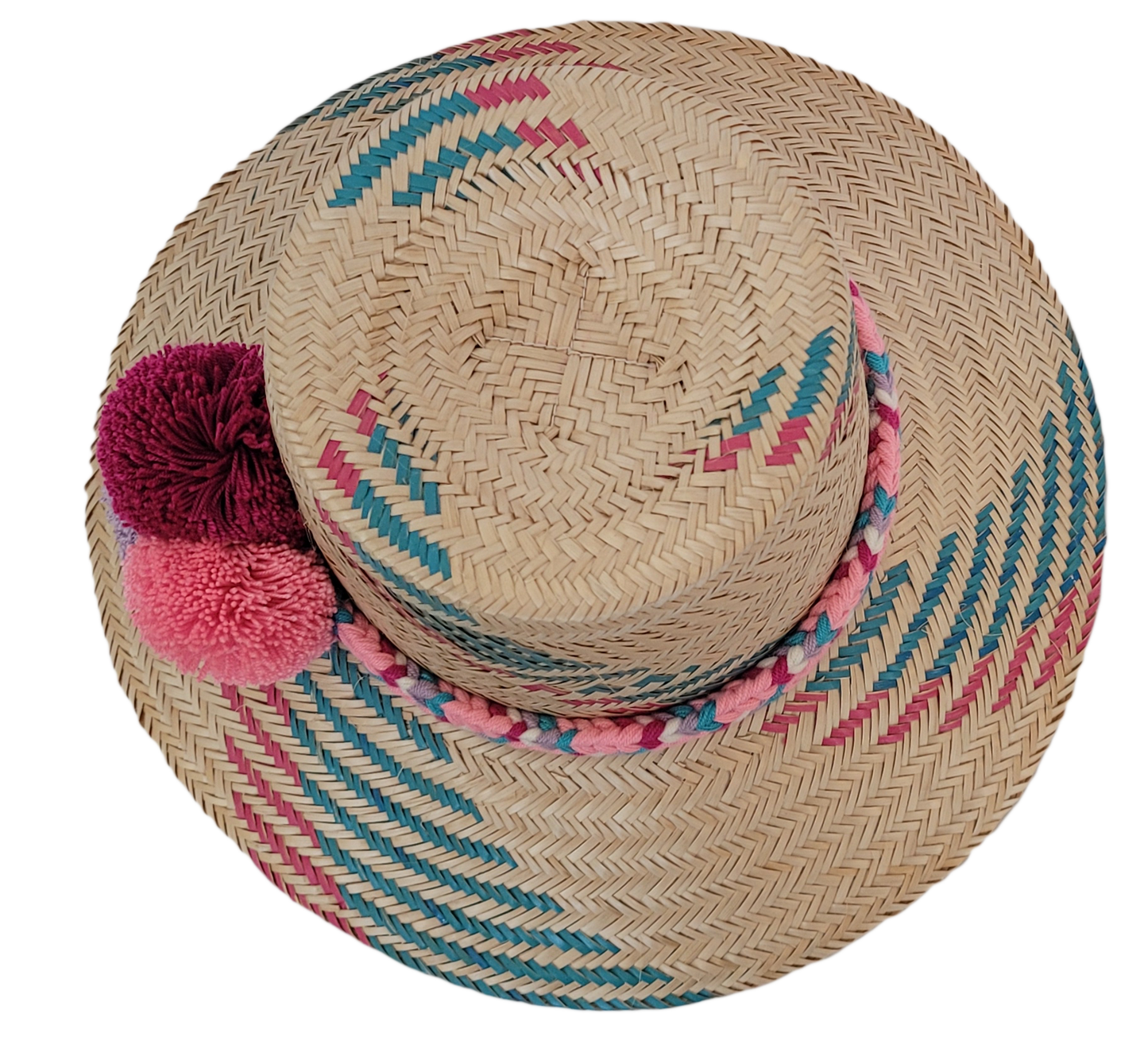 Handmade straw hat with bold pink, purple, and burgundy pompoms