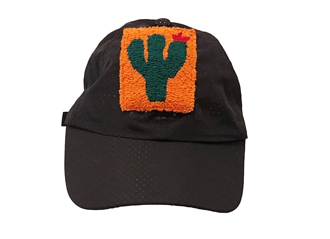 "Artisan-crafted Baseball Cap with a colorful, Wayuu-inspired Needle Punch Patch by Wuitusu, showcasing traditional and moder