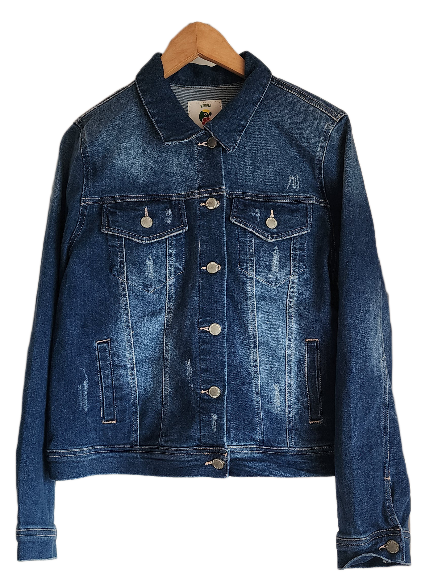 "Artisan-made denim jacket with vibrant, handcrafted punch needle embroidery on the back, showcasing unique, colorful designs