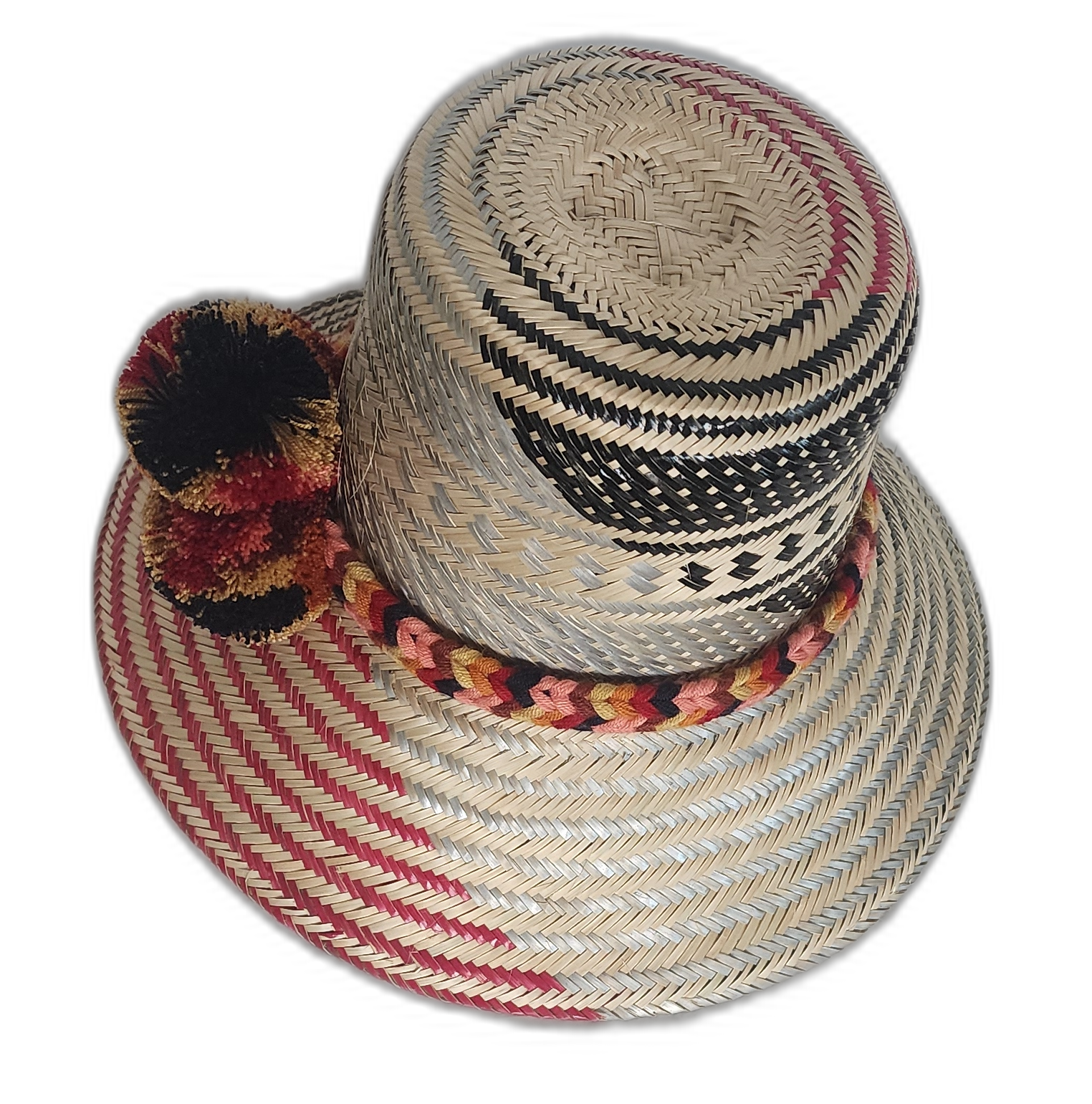 Colorful Wayuu hat with red spiral brim, black and gold pompoms, and braided band