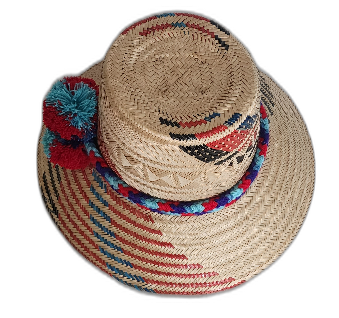 Colorful bohemian straw hat with bold geometric design and handmade pompoms