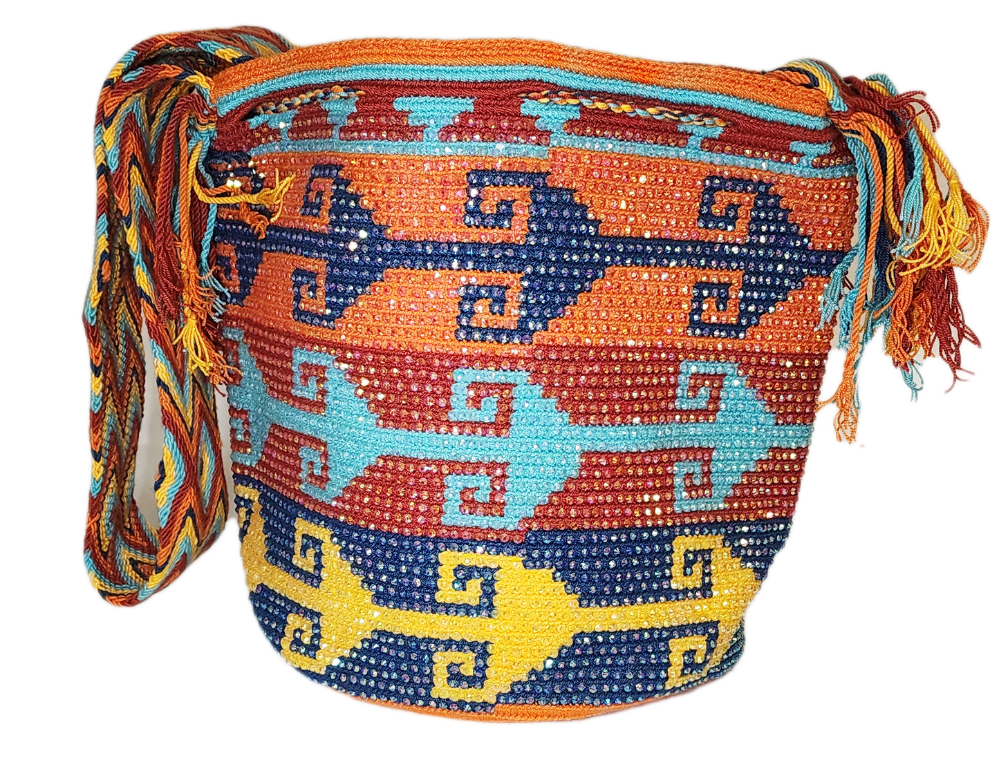 Colorful Wayuu artisan bag featuring bold shapes and tassel accents.