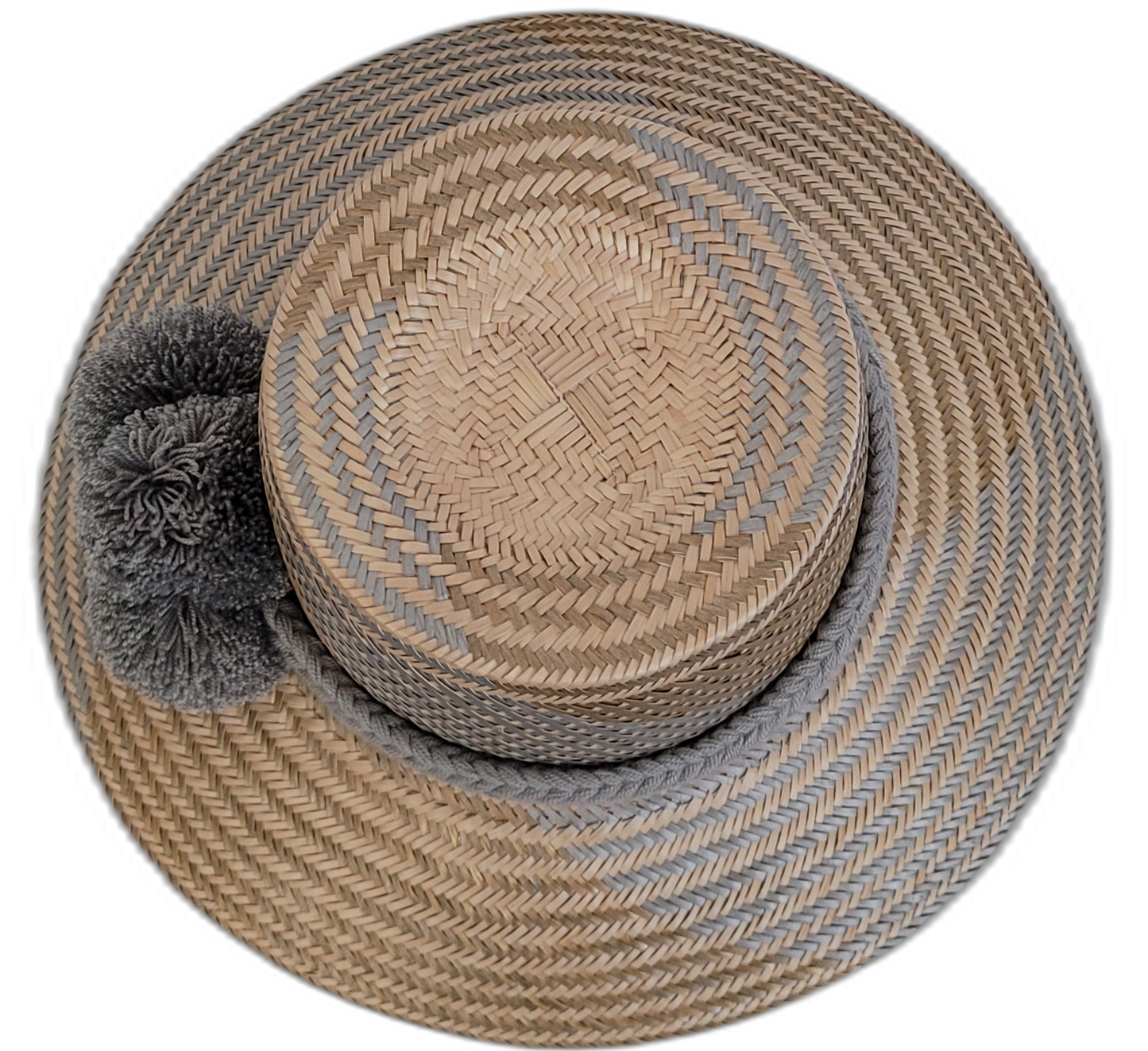 Elegant gray Wayuu straw hat with handmade details and gray pompoms.