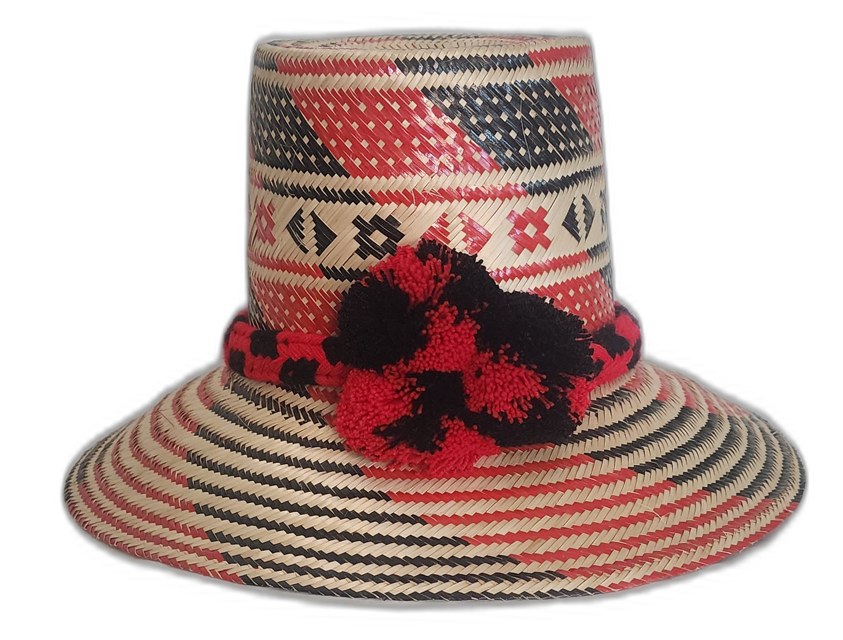 Boho hat with tribal black and red patterns and matching artisan pompoms