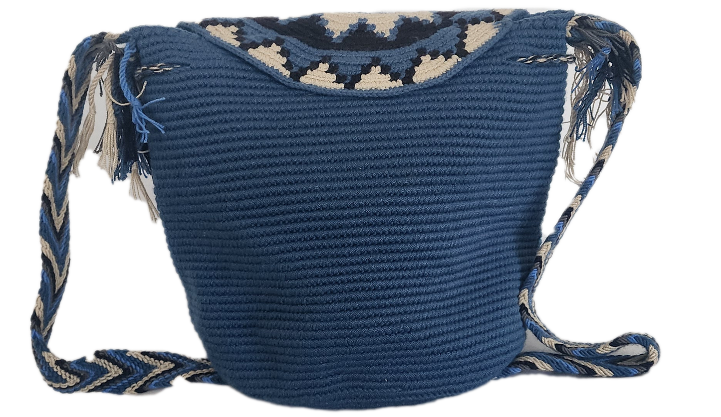 Artisan-crafted Wayuu crochet bag with bold sun design, fringe sides, and rich blue tones — perfect for a modern boho wardrobe.