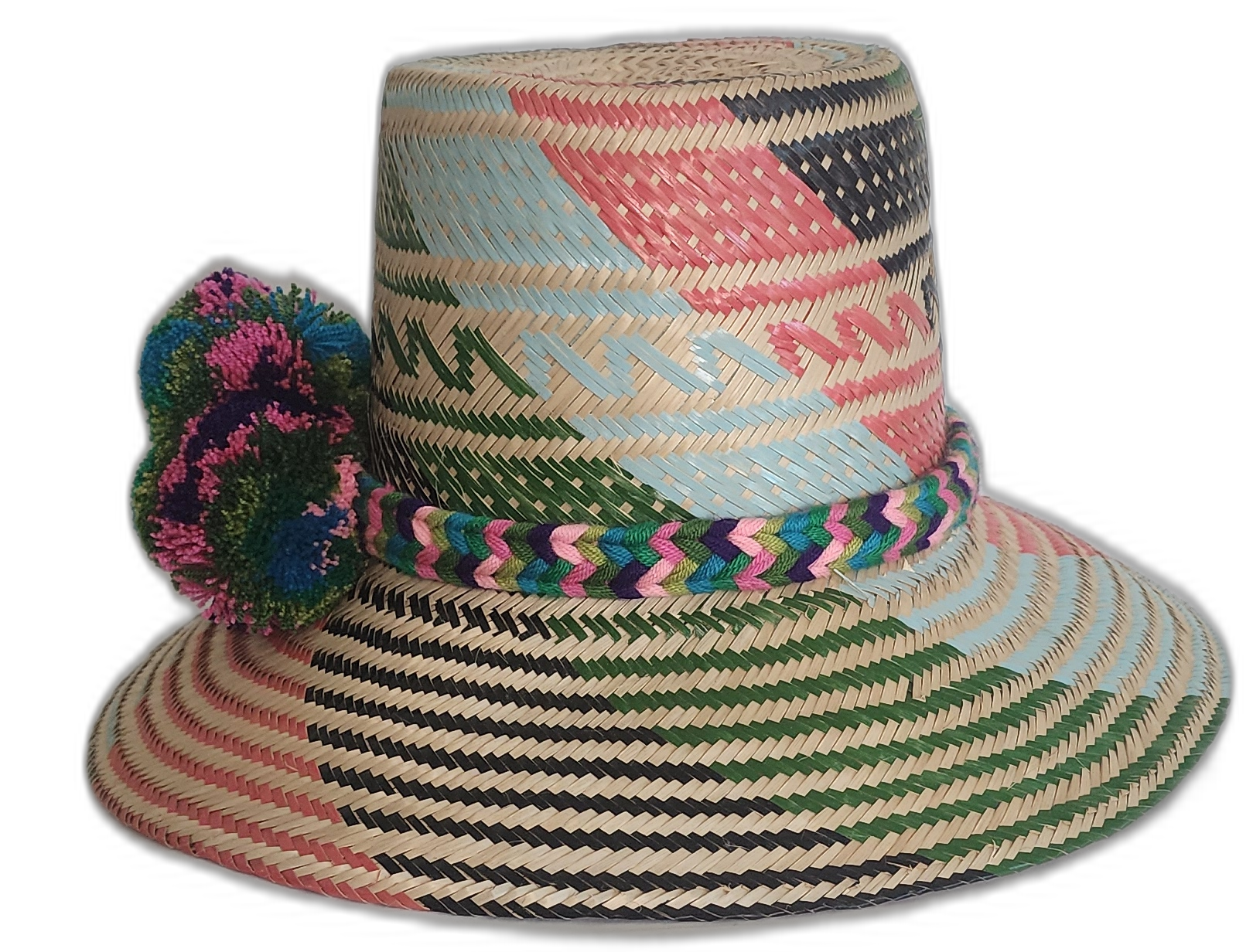 Boho chick straw hat with zigzag pastel patterns and artisan pompoms in pink, green, and blue.