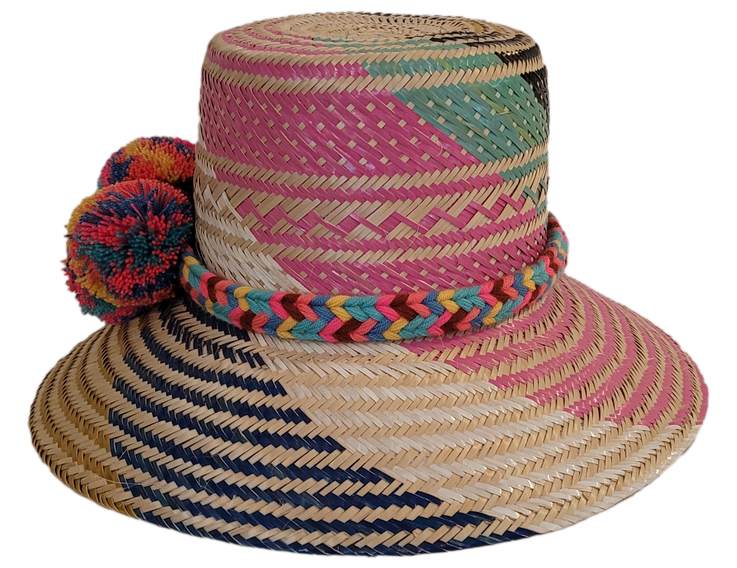 Boho straw hat handmade with pink, navy, and yellow weave and bright pompoms.