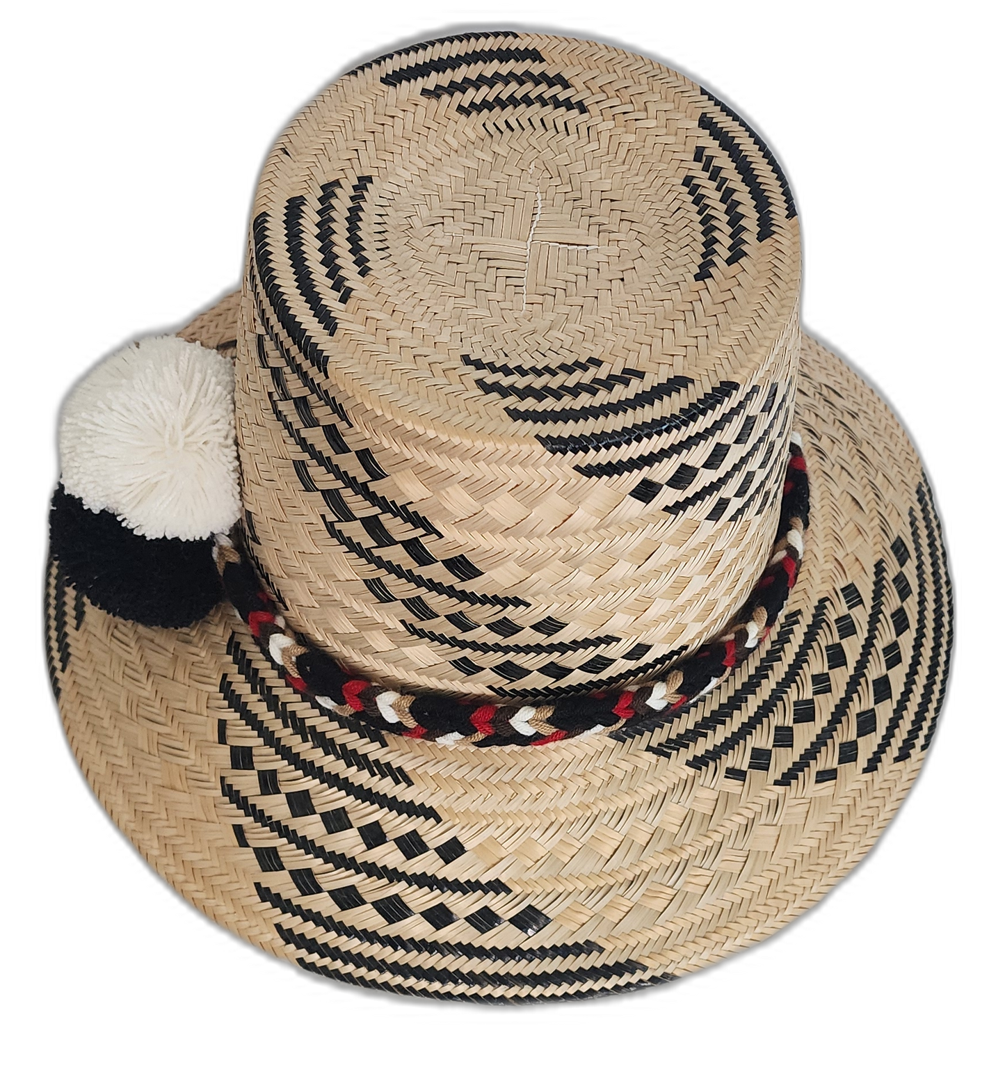 Artisan Wayuu hat featuring red-accented band and three-tone pompoms