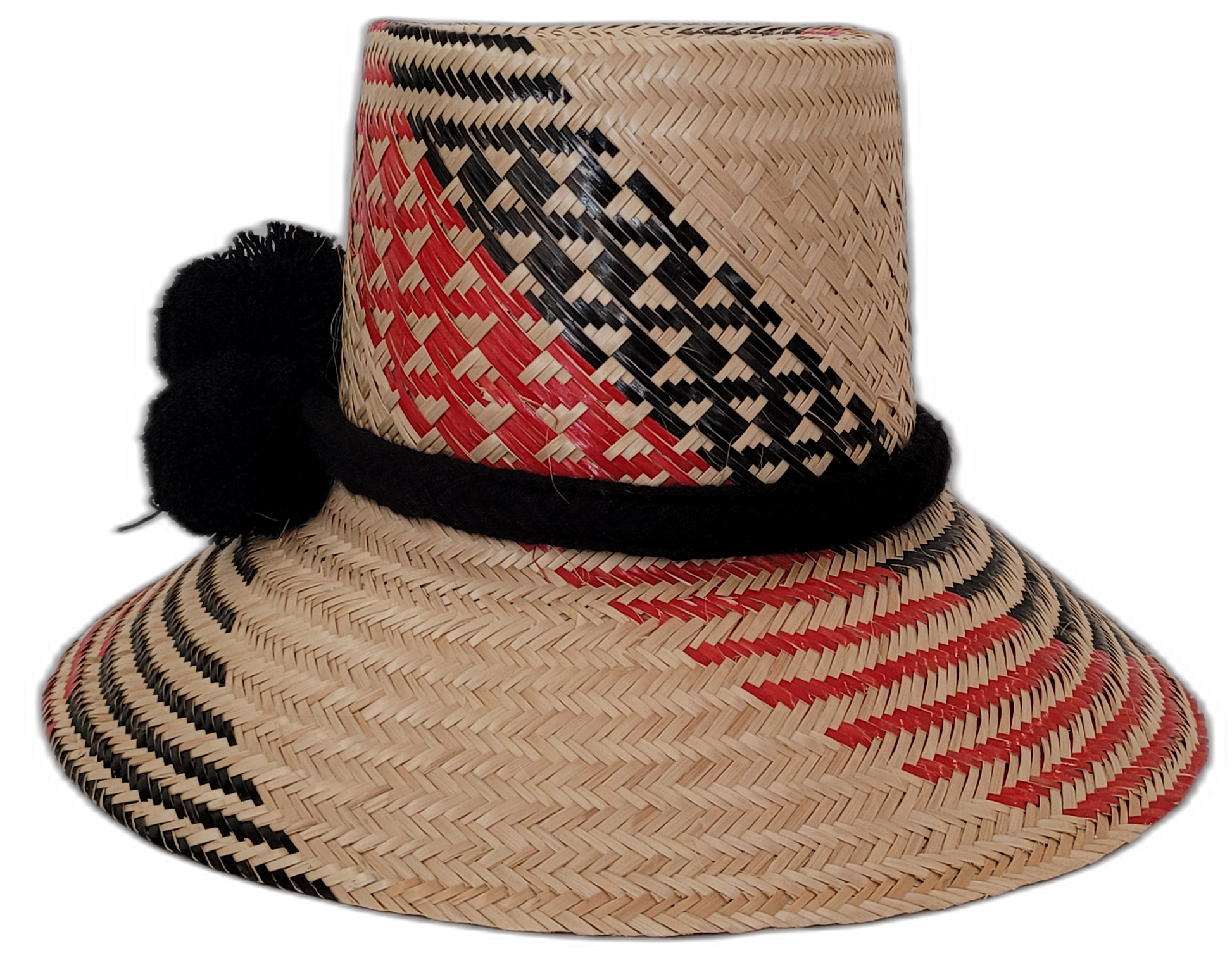 Boho chic Wayuu hat featuring bold red and black weave and handmade pompom accent