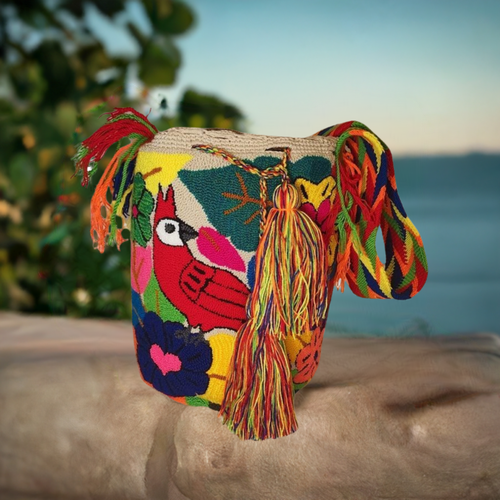 Handmade Wayuu crochet bag with red cardinal and floral motifs