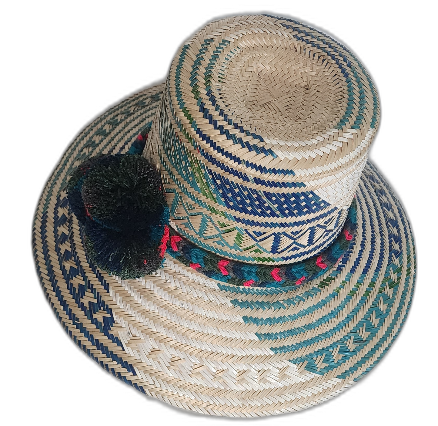 Boho chick hat with natural and deep blue handwoven textures, finished with culturally inspired pompoms.