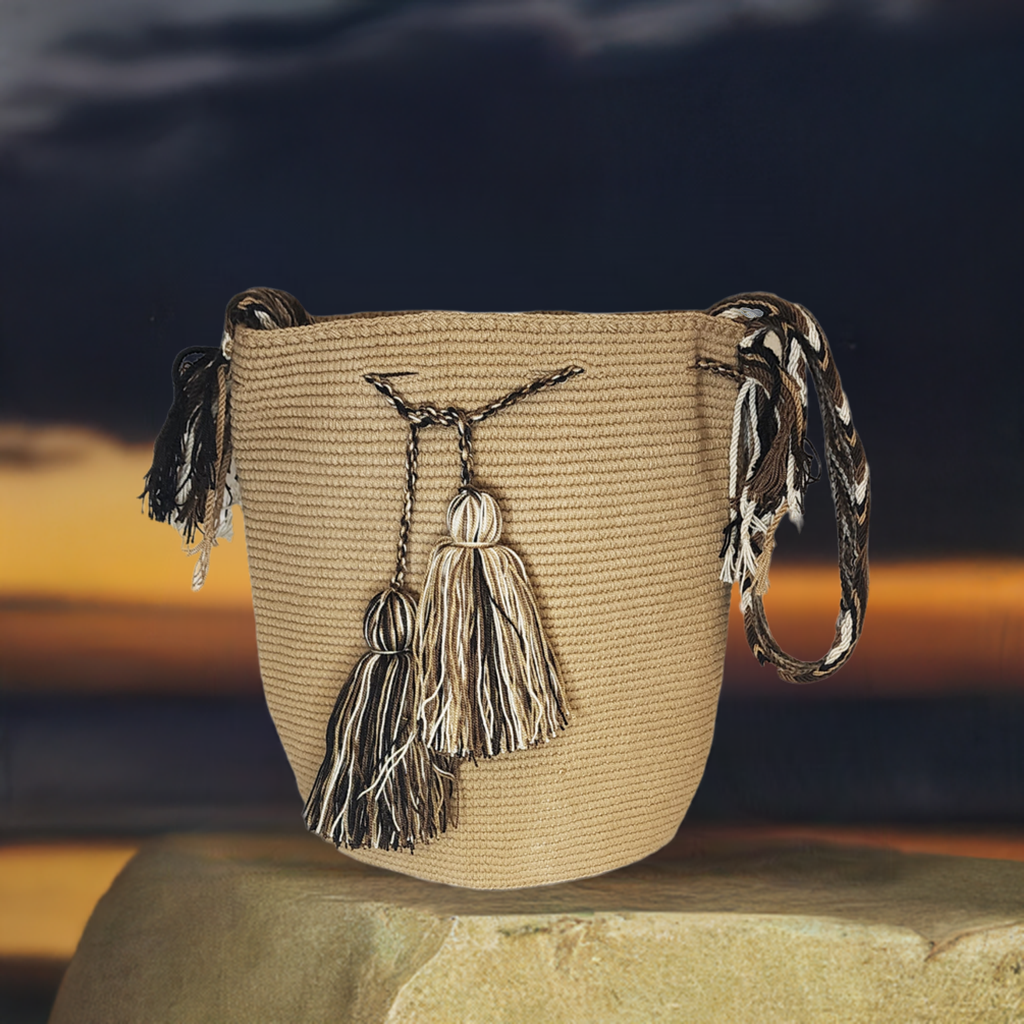 Colorful handmade crochet bags by Wuitusu, showcasing traditional Wayuu patterns and vibrant cultural symbols.