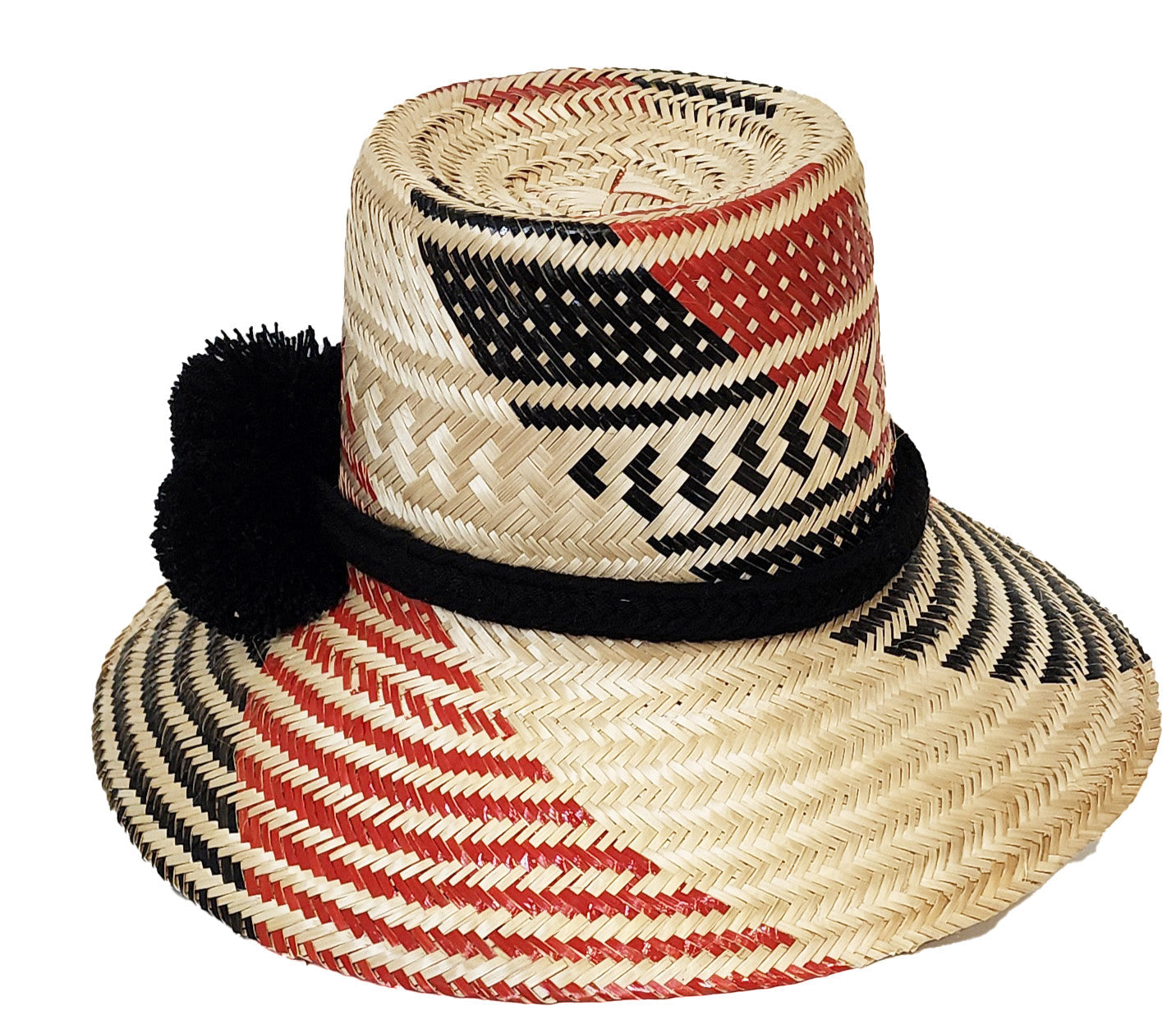 "Colorful Artisan Wayuu Hat handcrafted from iraca palm fibers, featuring vibrant designs and broad brim for sun protection."