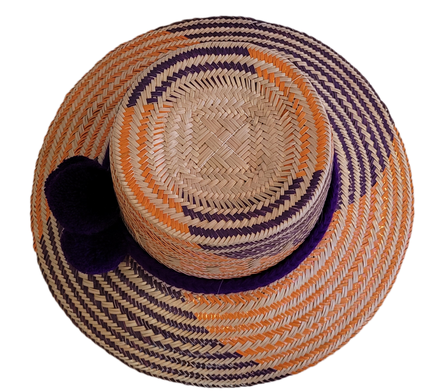 Unique Boho chick straw hat, handmade from Iraca palm in vibrant purple and orange.