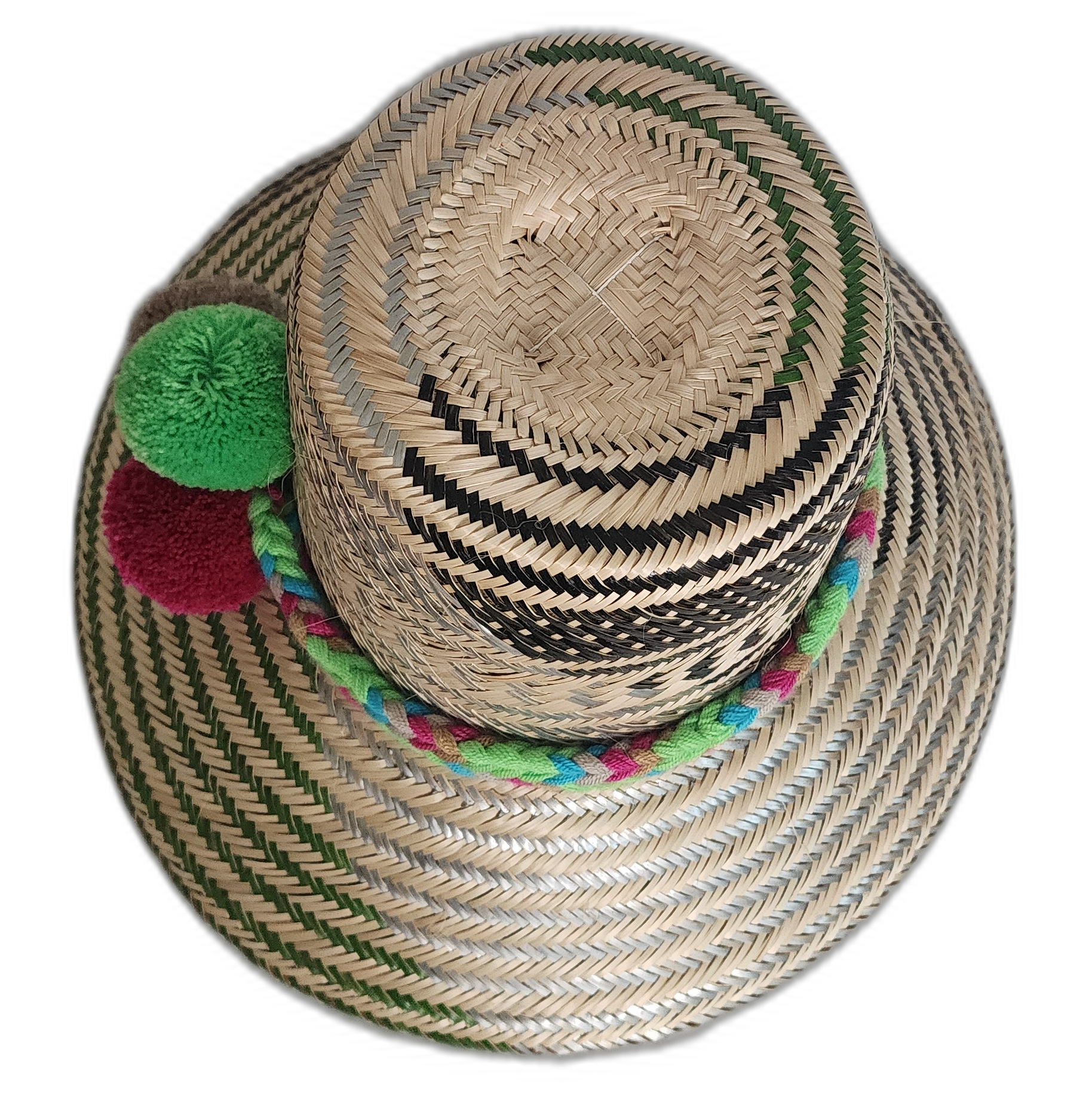 Artisanal Wayuu straw hat in natural tones, accented with bold colorful pompoms