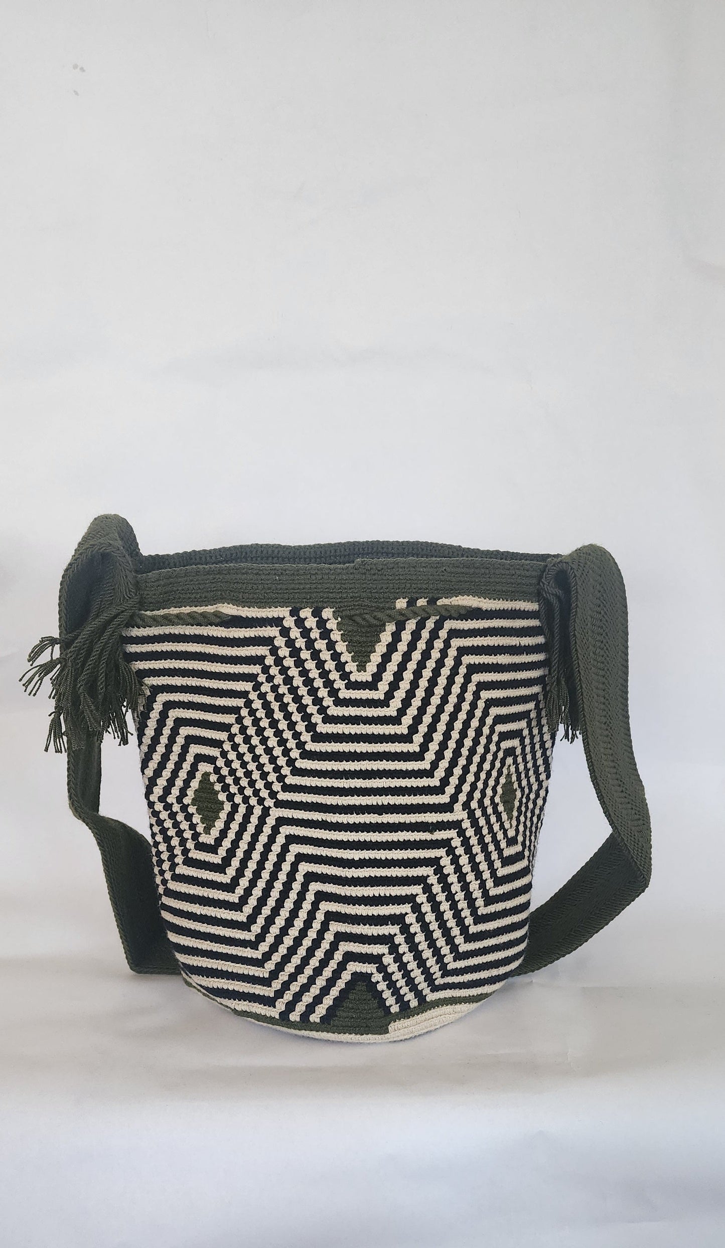 "Colorful handmade Crochet Wayuu bag with geometric motifs, crafted by indigenous artisans, perfect for versatile use."