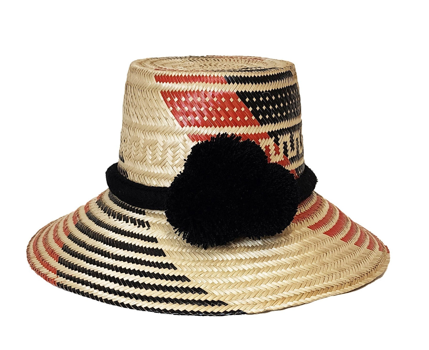 "Colorful handmade straw hats by Wuitusu, crafted by the Wayuu tribe using dyed Iraca palm fibers, with adjustable sizing and
