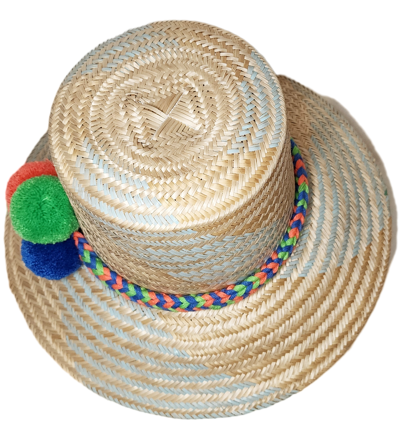 "Colorful handmade Wayuu hat from Iraca palm fibers, adorned with symbolic pompoms, showcasing traditional Colombian and Vene