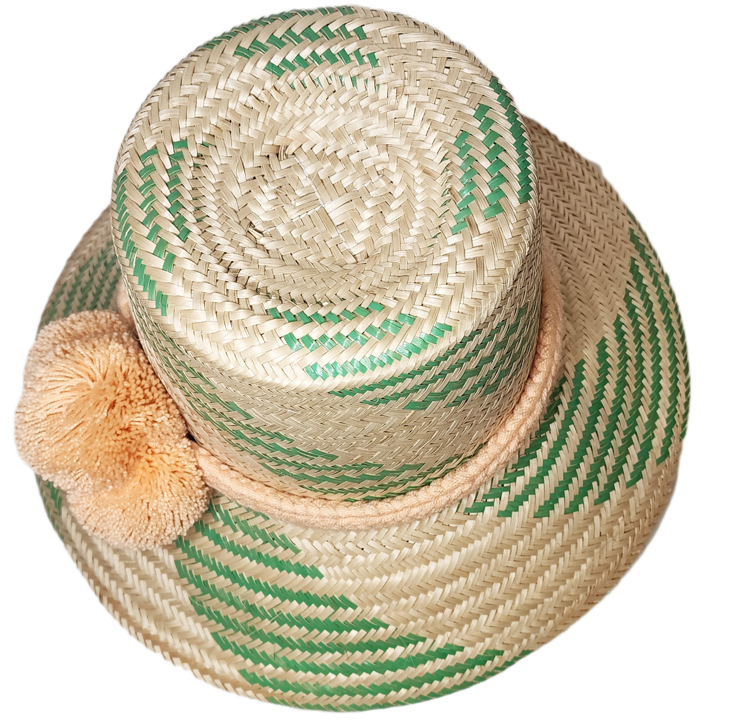 "Colorful handmade Wayuu hat by Wuitusu, adorned with significant cultural pompoms, crafted from Iraca palm fibers."