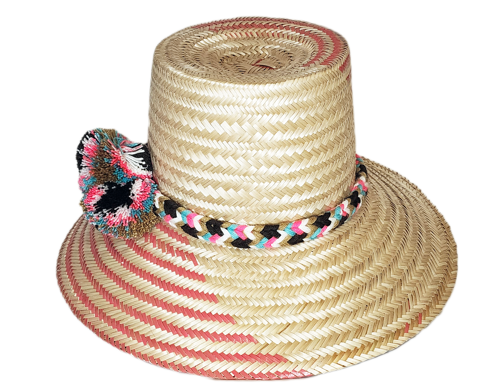"Colorful handmade Wayuu hat by Wuitusu artisans, adorned with significant cultural pompoms, crafted from Iraca palm fibers."