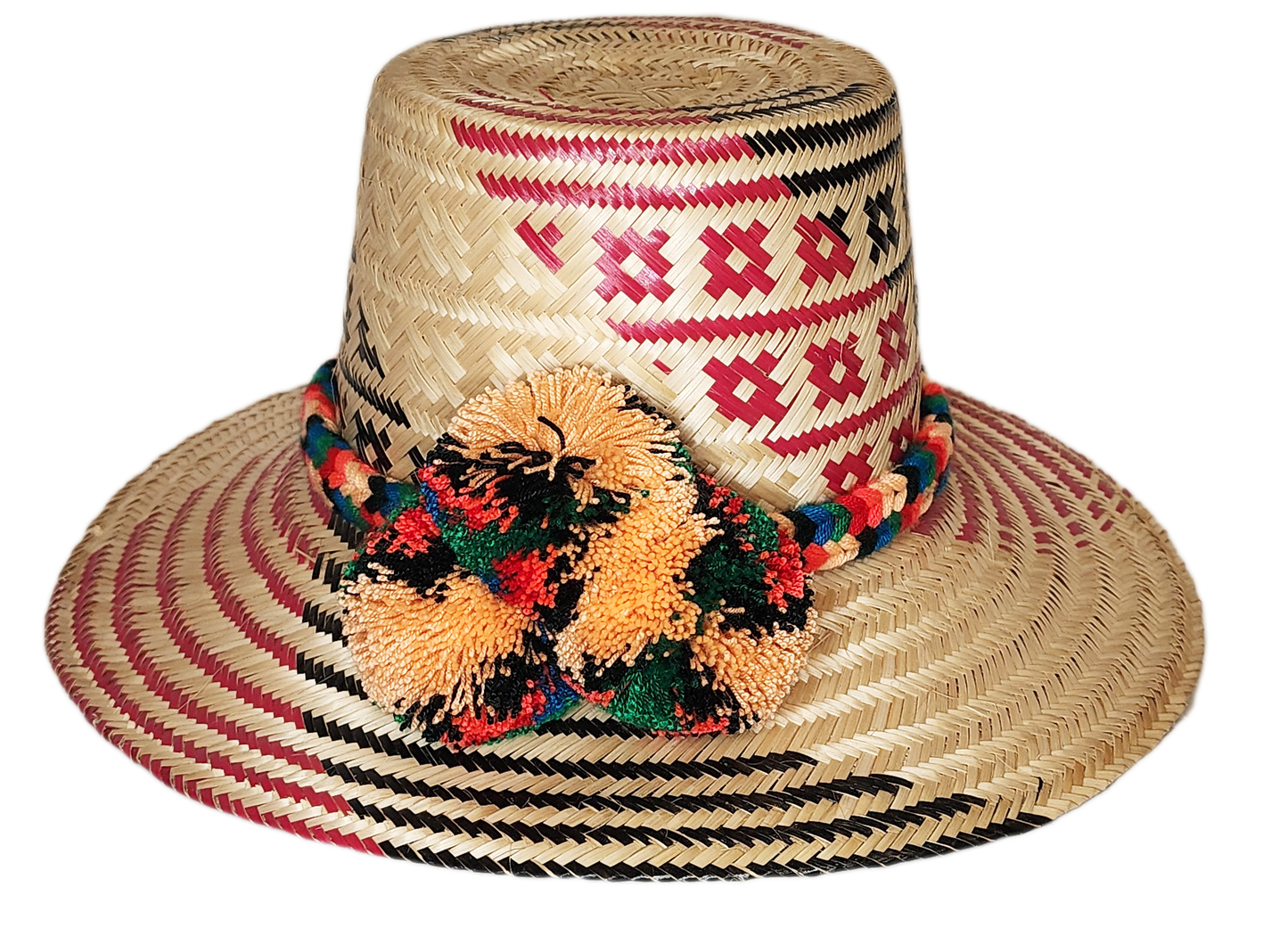 "Colorful handmade Wayuu hat by Wuitusu, crafted from Iraca palm fibers, adorned with significant pompoms for prosperity."