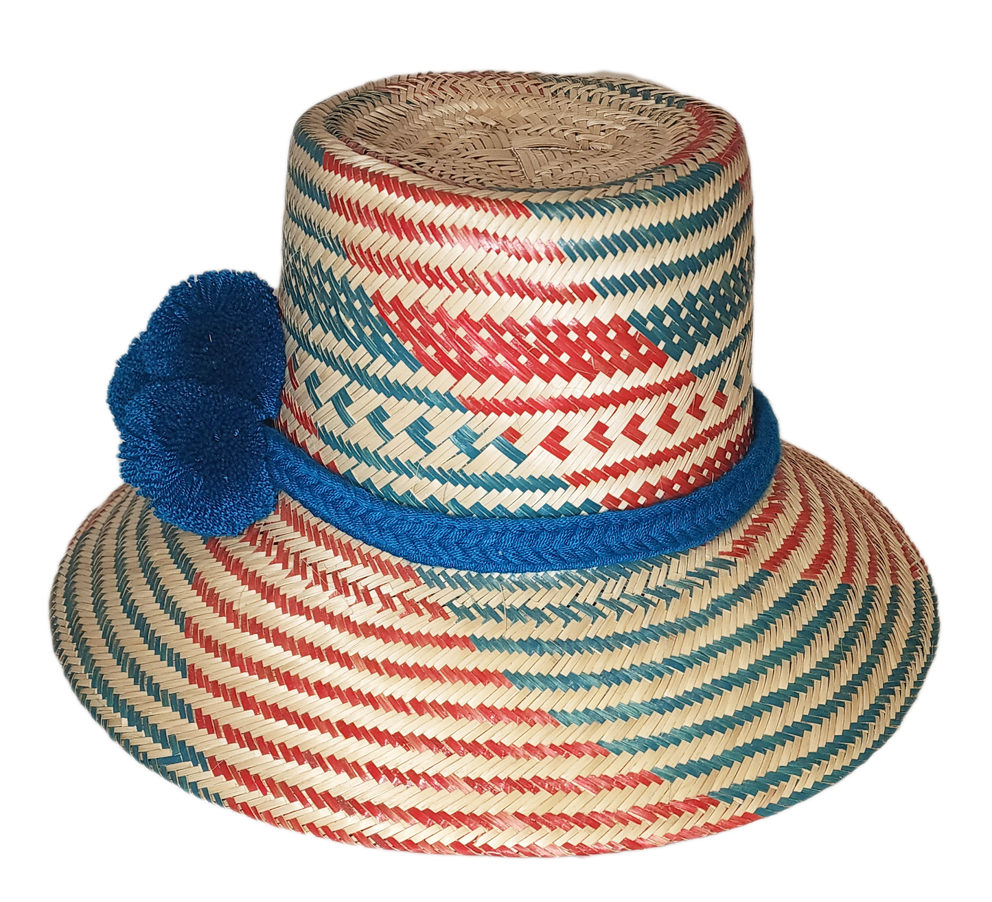 "Colorful handmade Wayuu hat by Wuitusu, crafted from Iraca palm fibers with unique pompoms, offering flexible wear styles."
