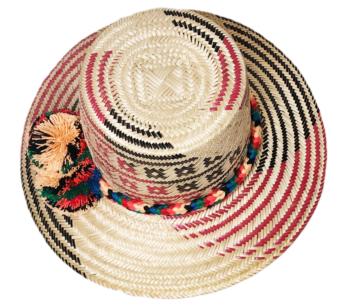 "Colorful handmade Wayuu hat by Wuitusu, crafted from Iraca palm fibers, adorned with significant pompoms for prosperity."