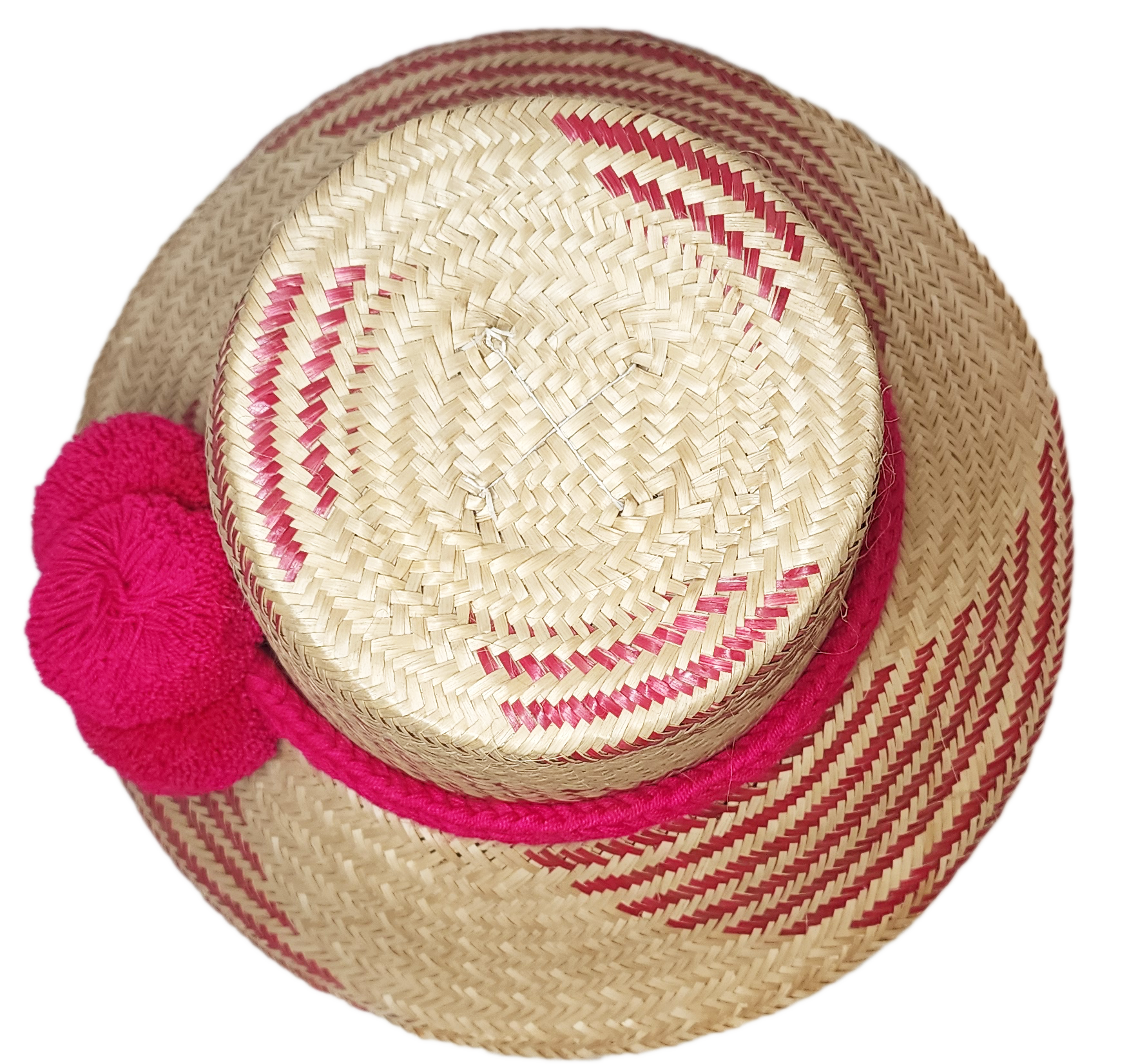 "Colorful handmade Wayuu hat crafted from Iraca palm fiber, adorned with significant pompoms, from Colombia and Venezuela."