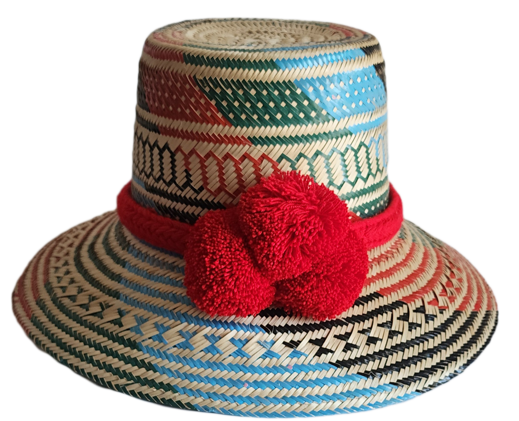 "Colorful handmade Wayuu hat crafted from Iraca palm fibers, adorned with significant pompoms, and adjustable for a perfect f