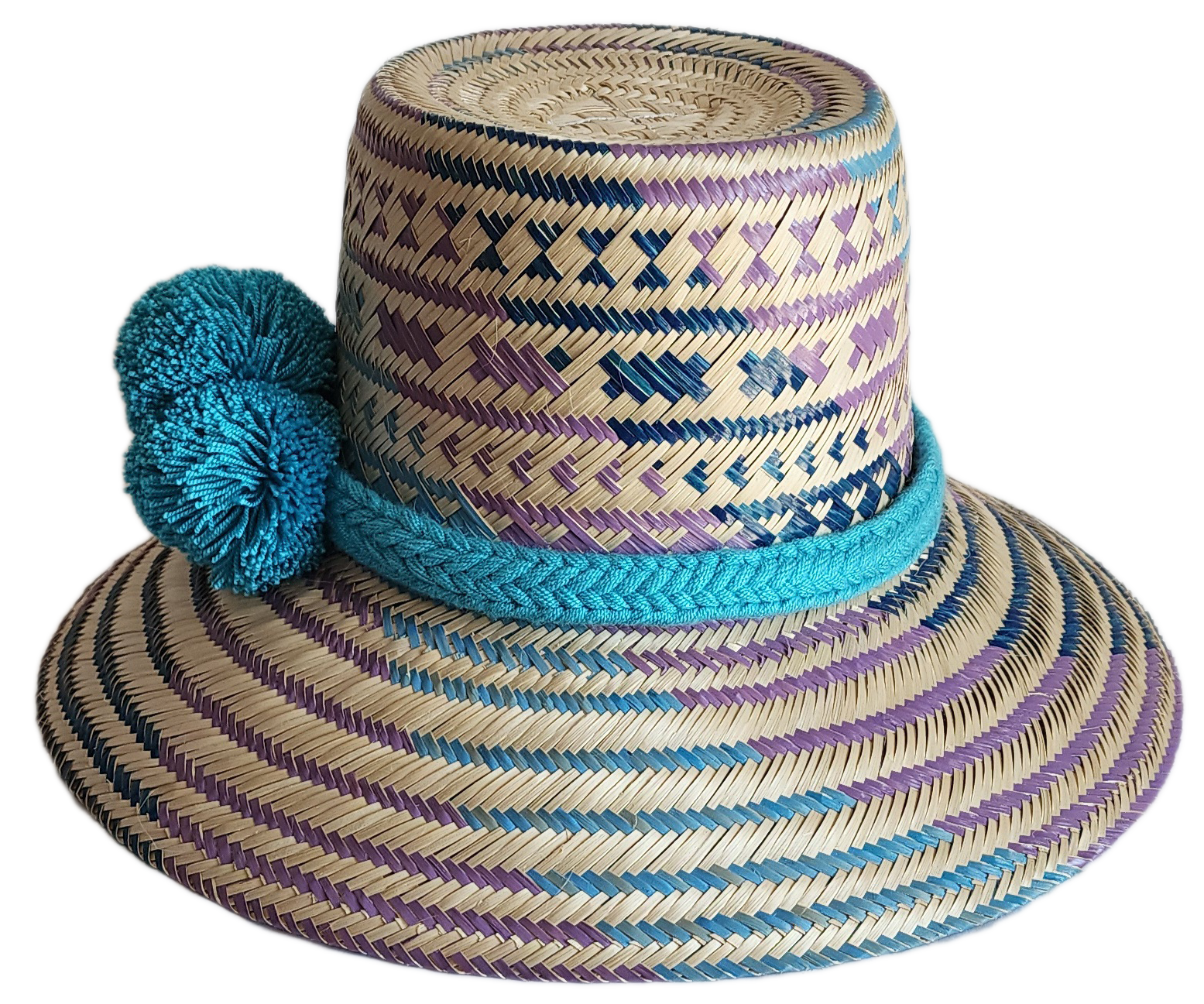 "Colorful handmade Wayuu hat crafted from Iraca palm fibers, adorned with meaningful pompoms, adjustable fit."