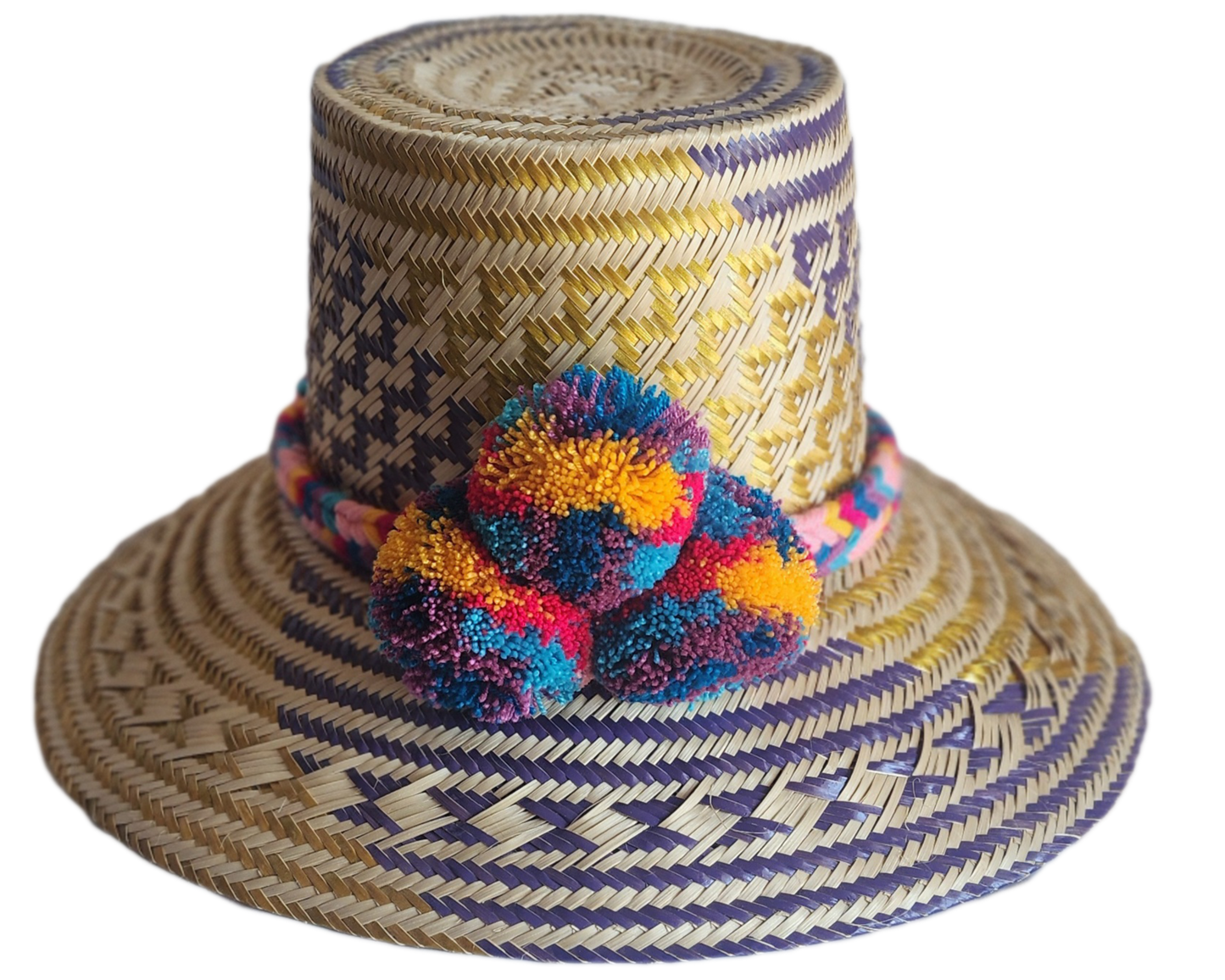 "Colorful handmade Wayuu hat from Iraca palm fibers, adorned with culturally significant pompoms, showcasing unique artisan c