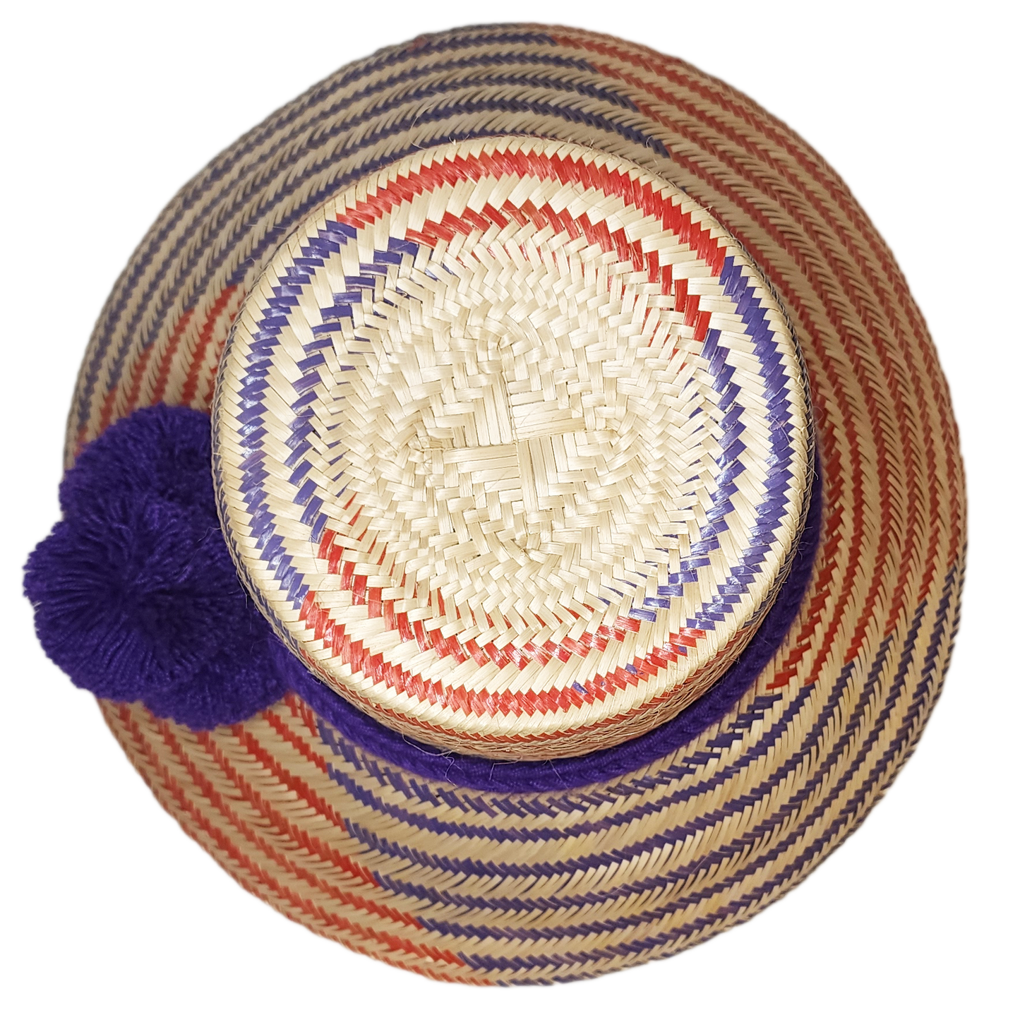 "Colorful, handmade Wayuu hat from Iraca palm fibers, adorned with culturally significant pompoms, showcasing artisan craftsm