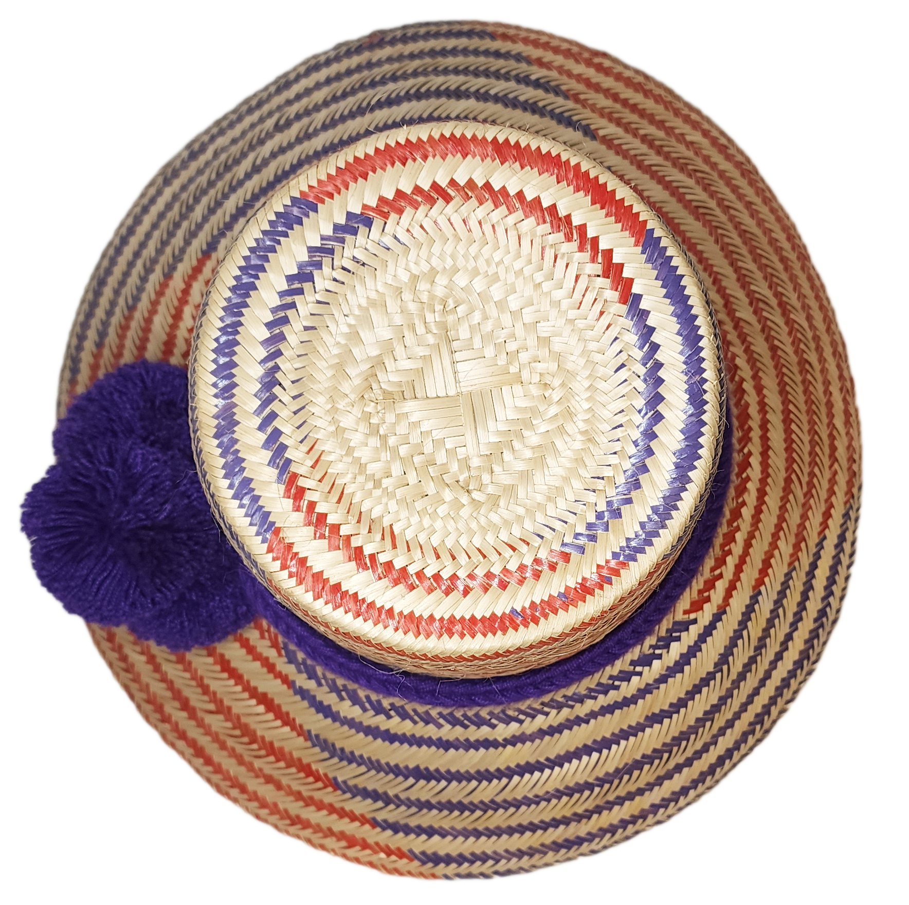 "Colorful, handmade Wayuu hat from Iraca palm fibers, adorned with culturally significant pompoms, showcasing artisan craftsm