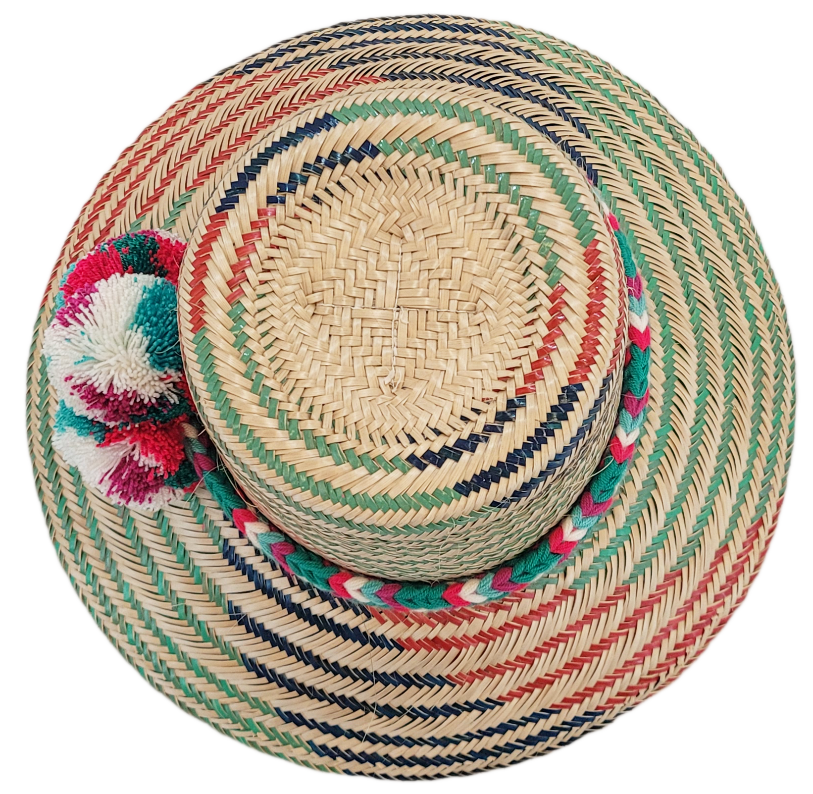 "Colorful handmade Wayuu hat with decorative pompoms, crafted from Iraca palm fibers, offering style and sun protection."