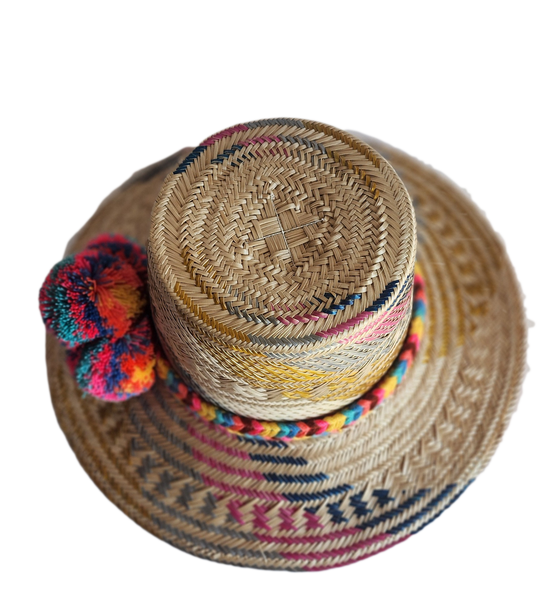 "Colorful handmade Wayuu hat woven from Iraca palm fibers by Colombian and Venezuelan artisans, adorned with traditional pomp