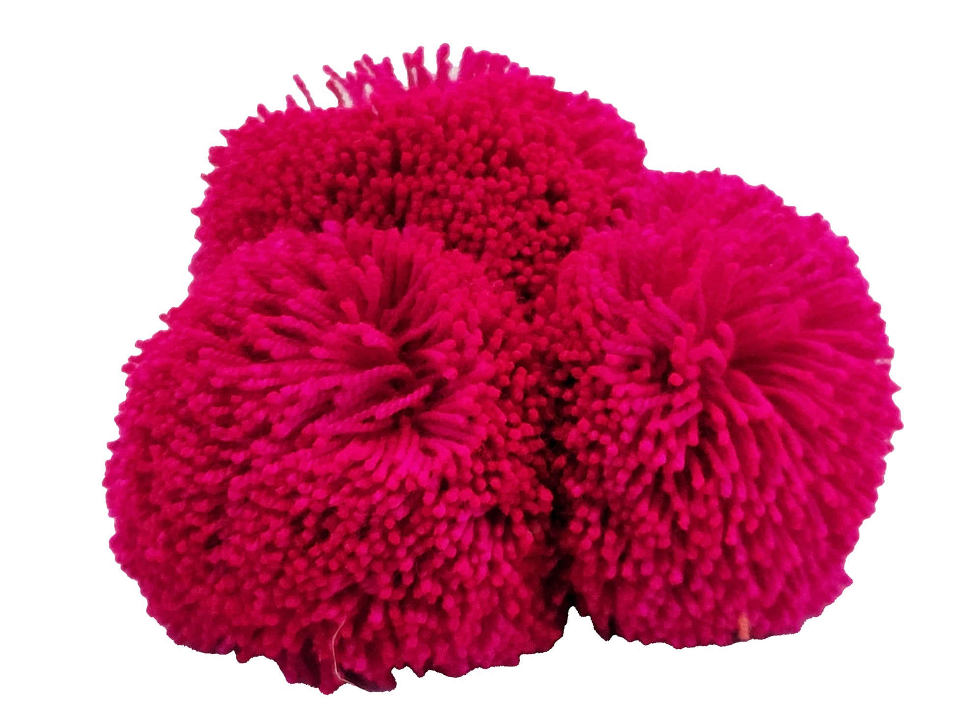 "Colorful handmade Wuitusu straw hat adorned with customizable pompoms, showcasing artisan craftsmanship and fair trade commi