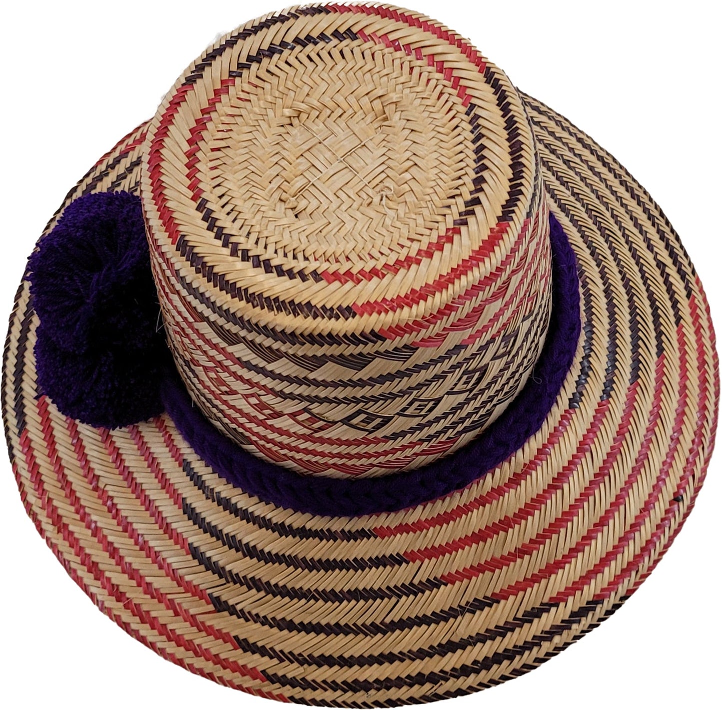 "Colorful handwoven Artisan Wayuu Hat made from iraca palm fibers, featuring a broad brim for sun protection and vibrant patt