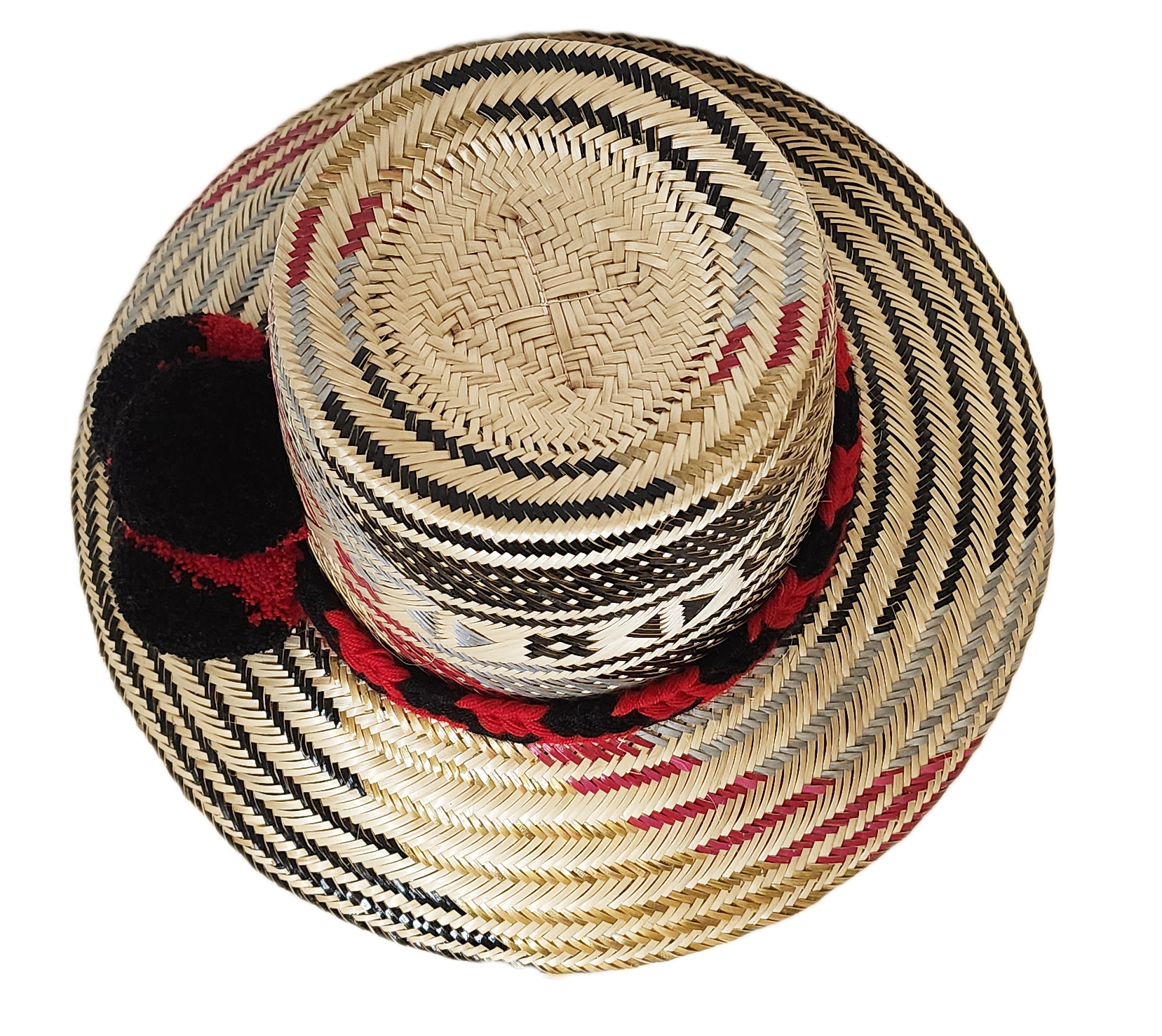 "Colorful, handwoven Wayuu hat from Wuitusu, adorned with culturally significant pompoms, offering flexible styling and sun p