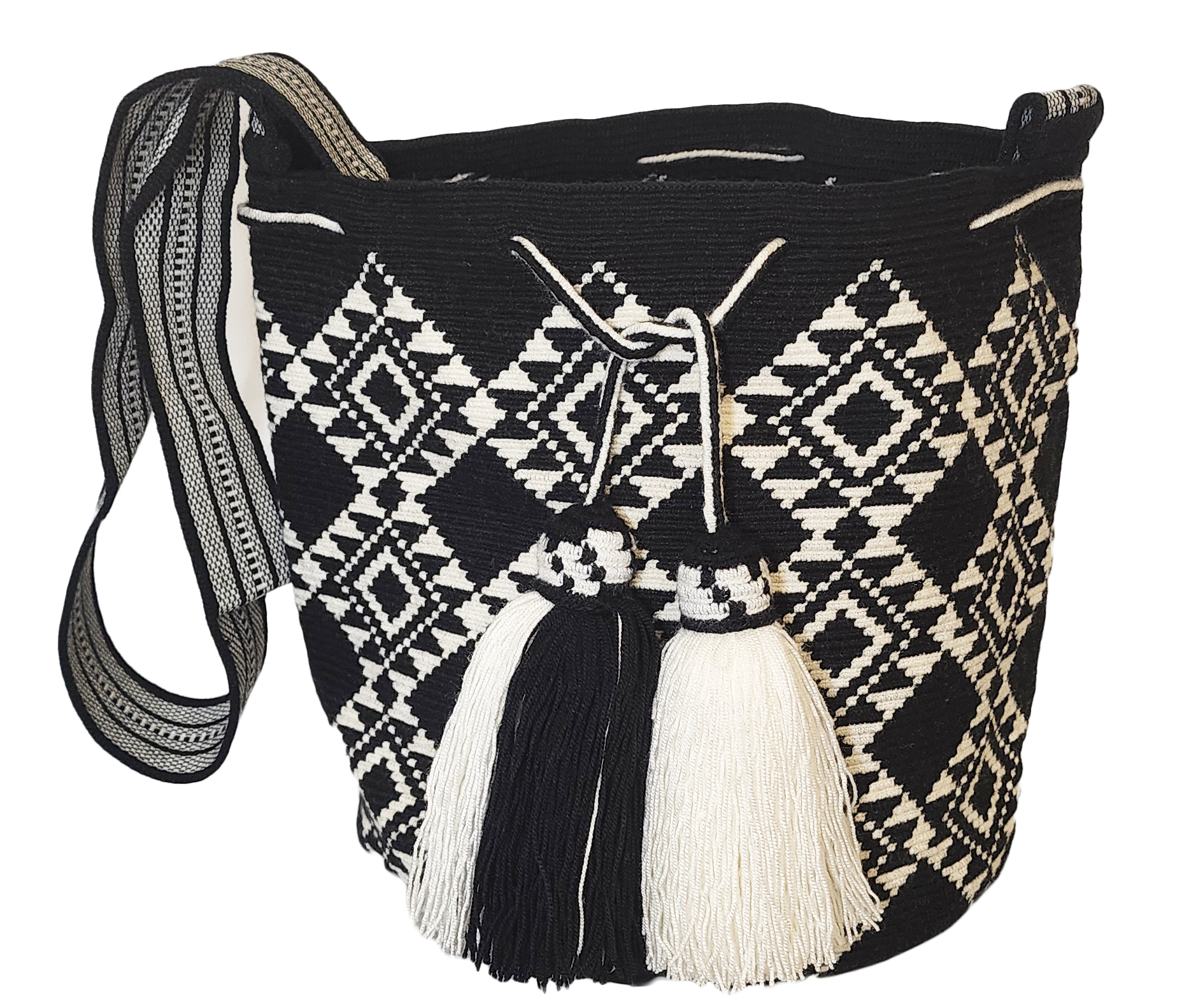 Bohemian crochet bag, handmade by Wayuu artisans, featuring black-and-white weave, diamond design, wide strap, and oversized two-tone tassels.