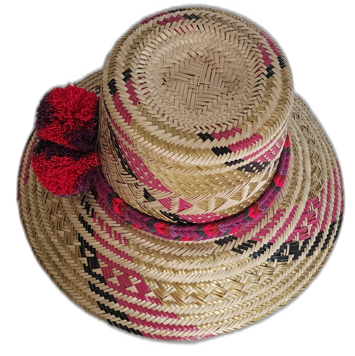 Colorful boho straw hat with pink and black geometric design and pompoms
