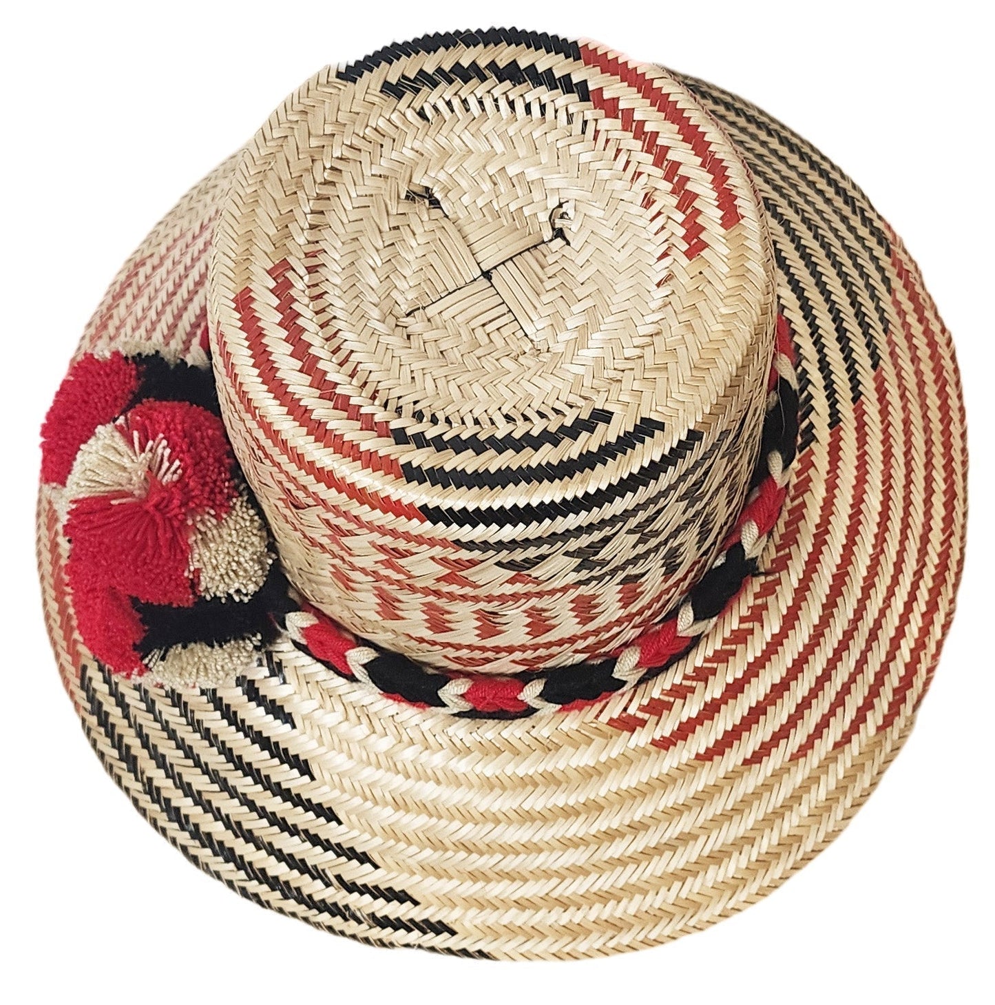 "Colorful Wuitusu Wayuu hat handwoven from Iraca palm fibers, featuring adjustable brim and decorative pompoms for sun protec