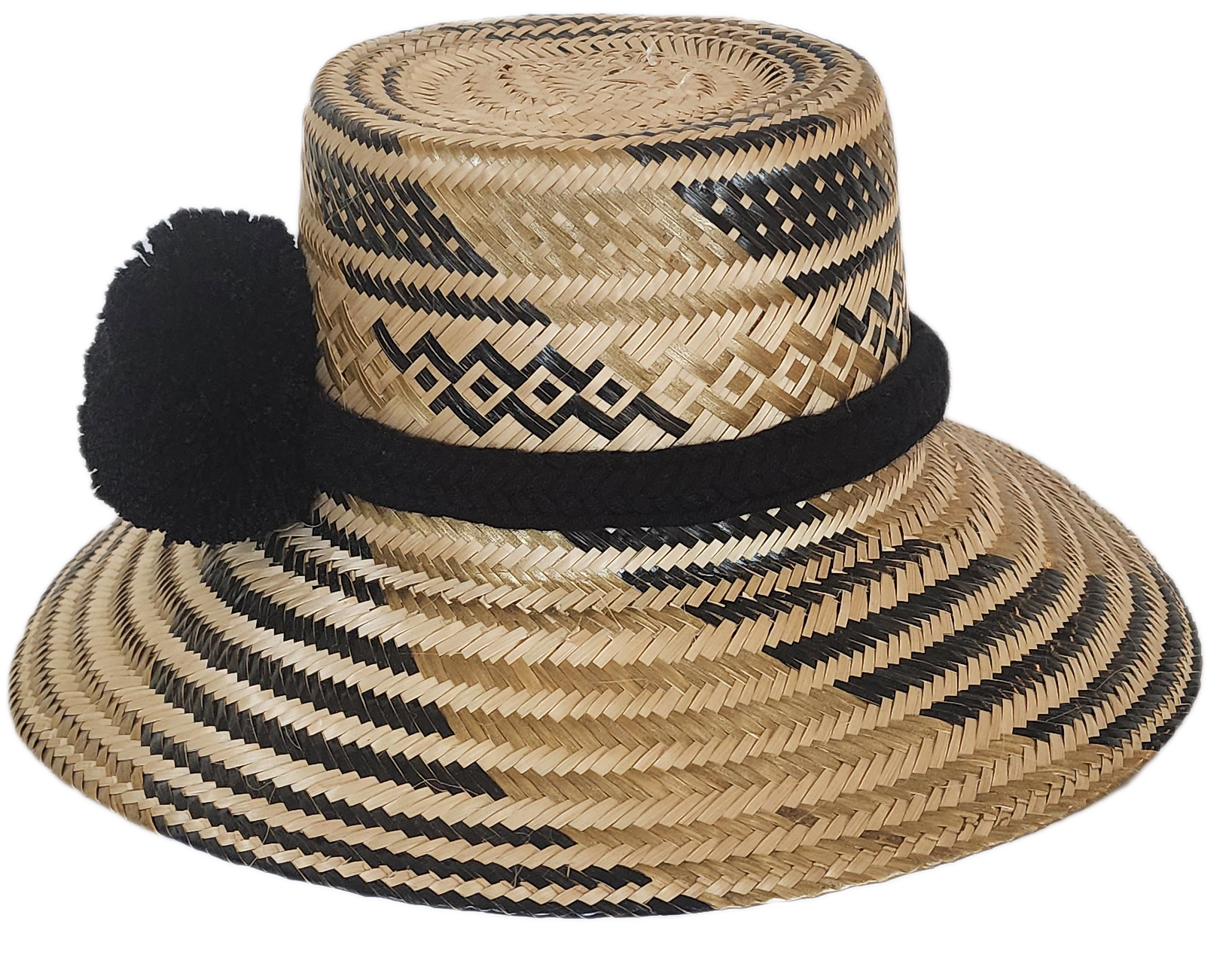 Handcrafted wide brim straw hat, perfect as a boho hat and loved for its warm weather hat flair.