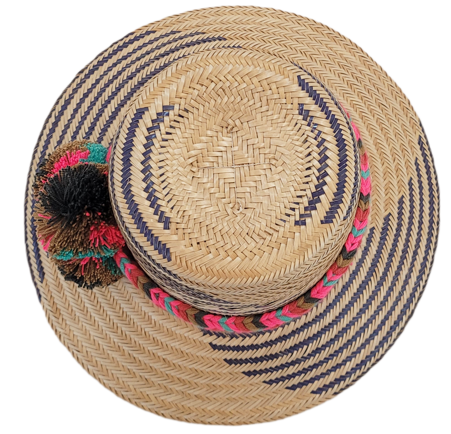 "Handcrafted Wayuu hat woven from Iraca palm fibers by artisans, adorned with colorful pompoms, offers style and sun protecti