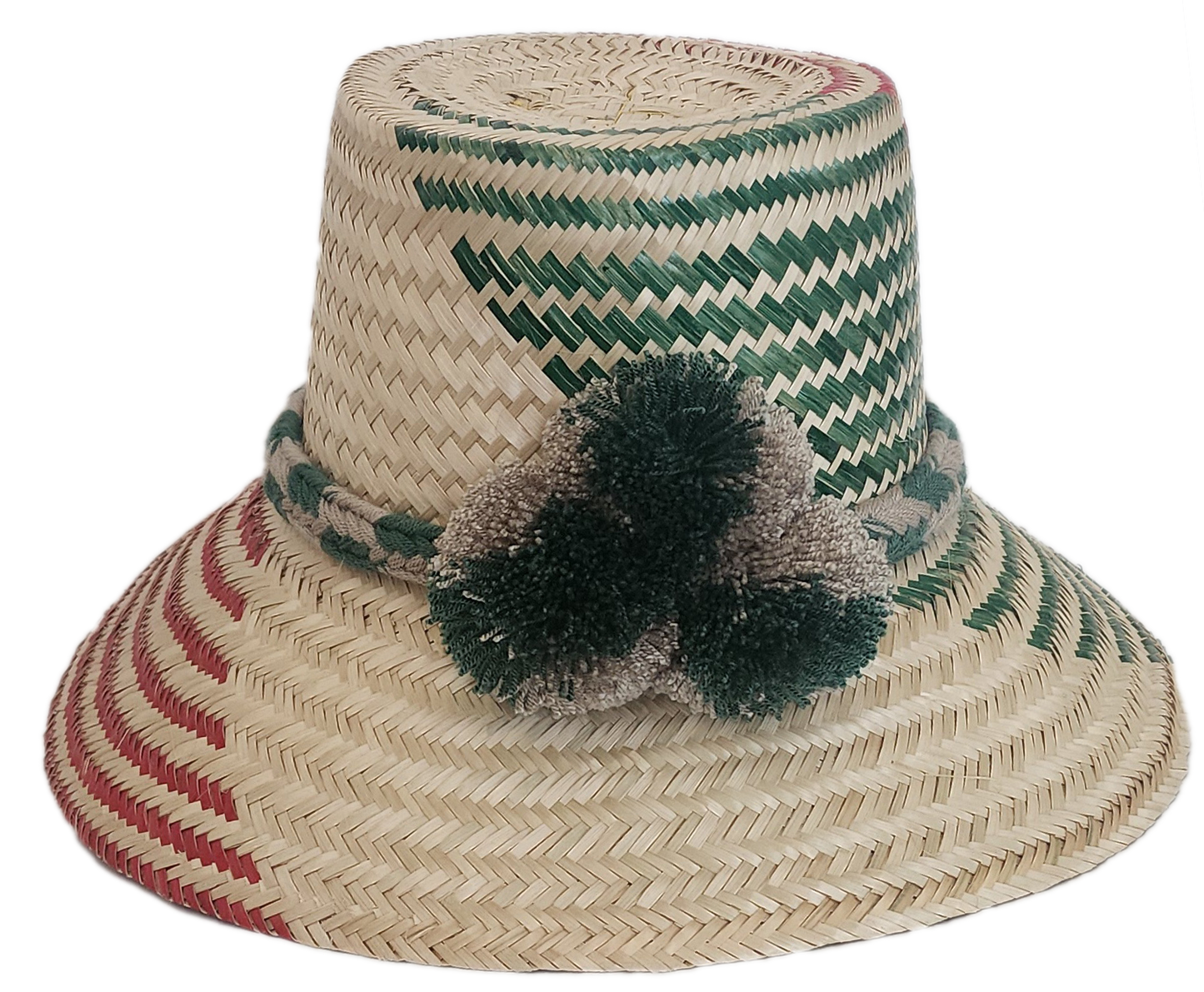 Wayuu handmade straw hat with green and red weave, neutral braided band, and soft pom-poms — artisan-crafted.