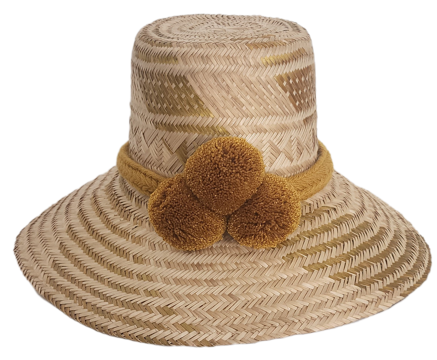 Handwoven Wayuu straw hat featuring a wide brim and mustard yellow pom-pom band. This bohemian, artisan-crafted hat blends traditional Wayuu design with a modern boho-chic style — perfect for sunny days, festivals, or beachwear.
